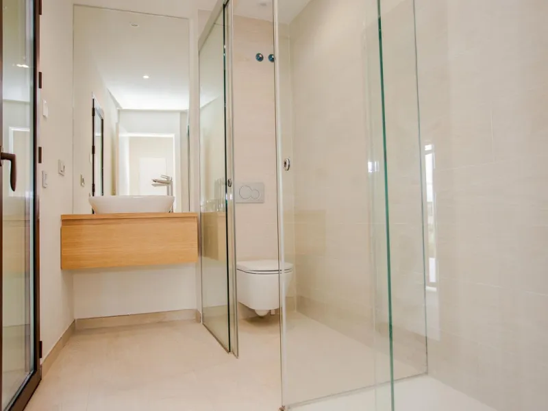 This stunning 2-bedroom ground floor apartment offers an exceptional living experience with 89 m² of constructed interior space, a 32 m² terrace, and a 73 m² private garden. Built with meticulous attention to detail, the apartment blends modern design wit