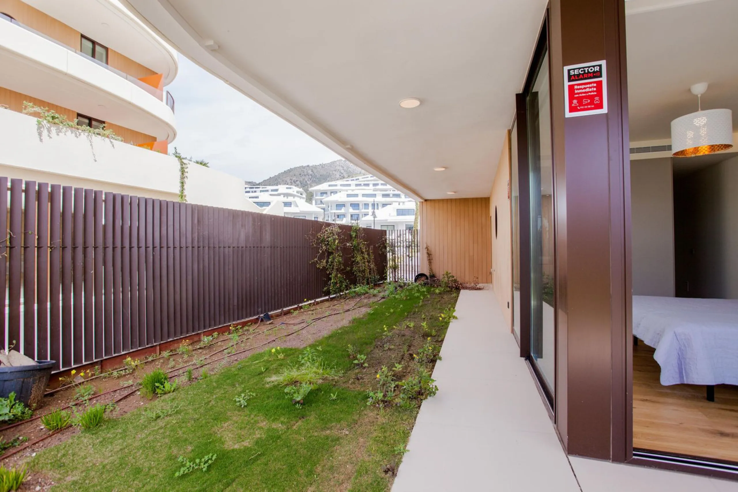 This stunning 2-bedroom ground floor apartment offers an exceptional living experience with 89 m² of constructed interior space, a 32 m² terrace, and a 73 m² private garden. Built with meticulous attention to detail, the apartment blends modern design wit