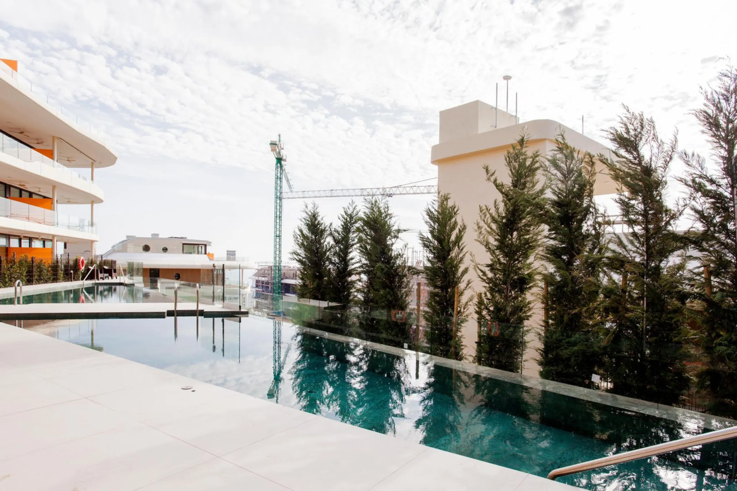 This stunning 2-bedroom ground floor apartment offers an exceptional living experience with 89 m² of constructed interior space, a 32 m² terrace, and a 73 m² private garden. Built with meticulous attention to detail, the apartment blends modern design wit