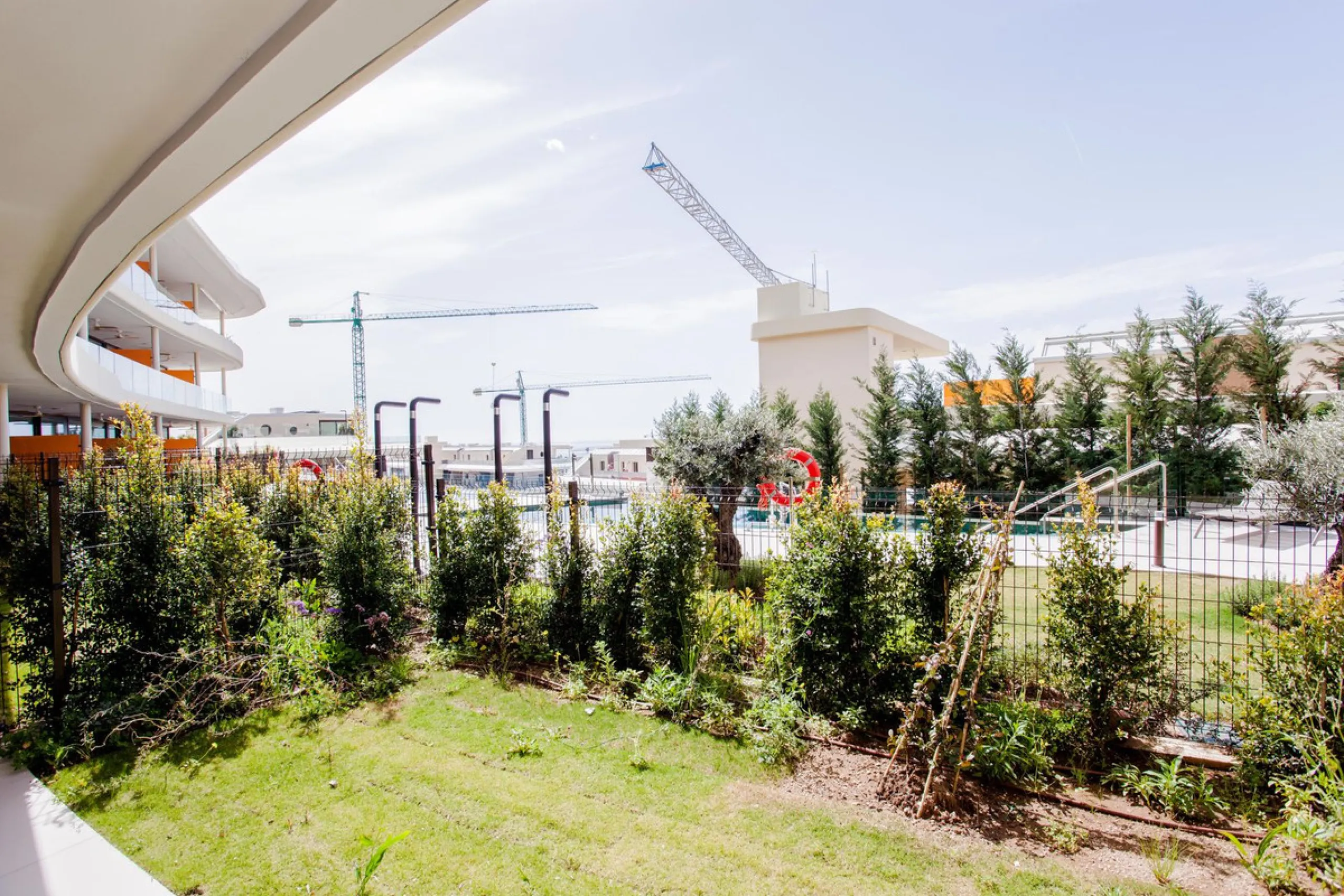 This stunning 2-bedroom ground floor apartment offers an exceptional living experience with 89 m² of constructed interior space, a 32 m² terrace, and a 73 m² private garden. Built with meticulous attention to detail, the apartment blends modern design wit