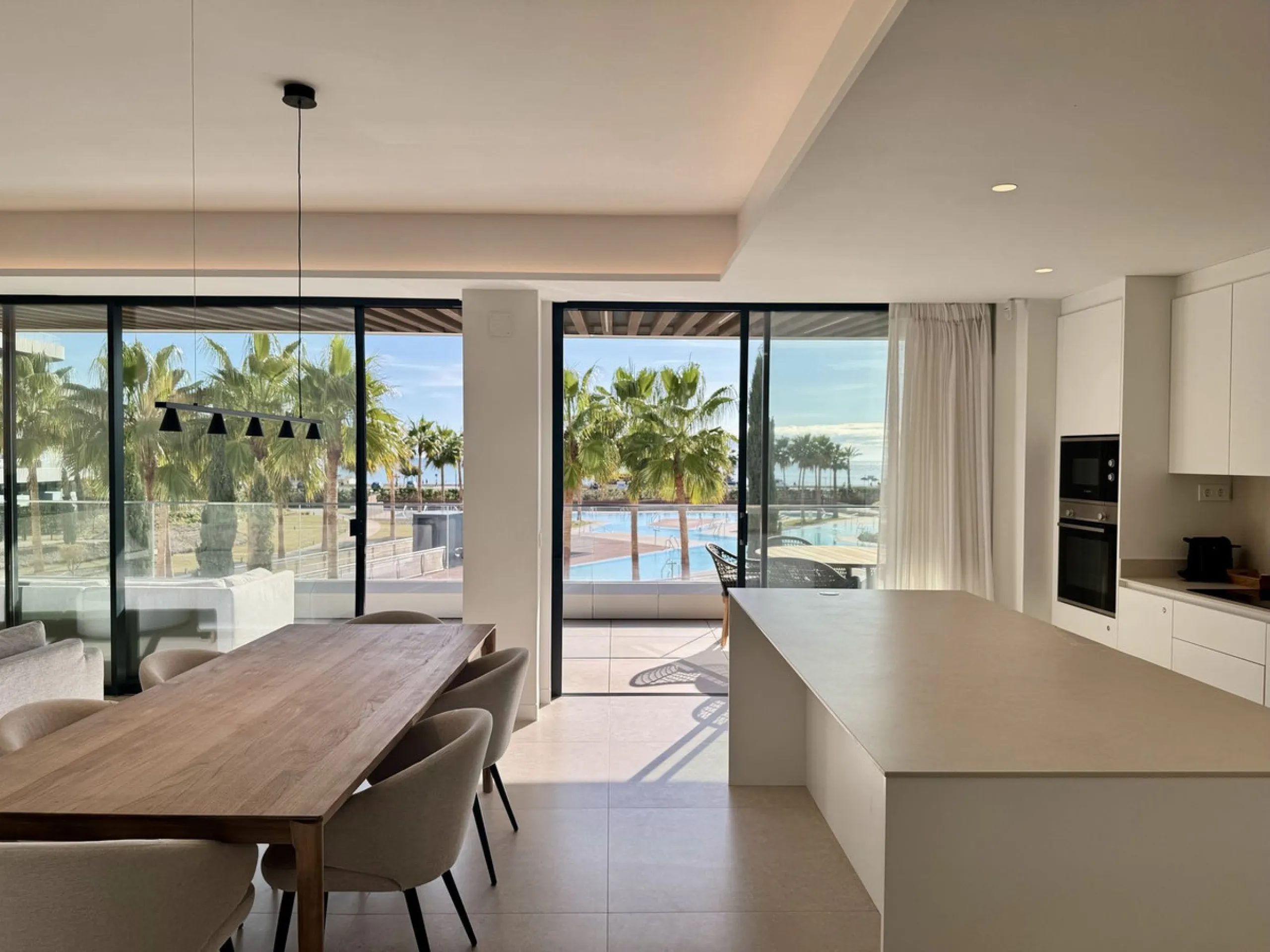 This luxurious beachfront apartment combines modern design with high-end amenities, making it an exceptional choice for coastal living. With its southeast orientation, the property enjoys abundant natural light and offers stunning, unobstructed views of t