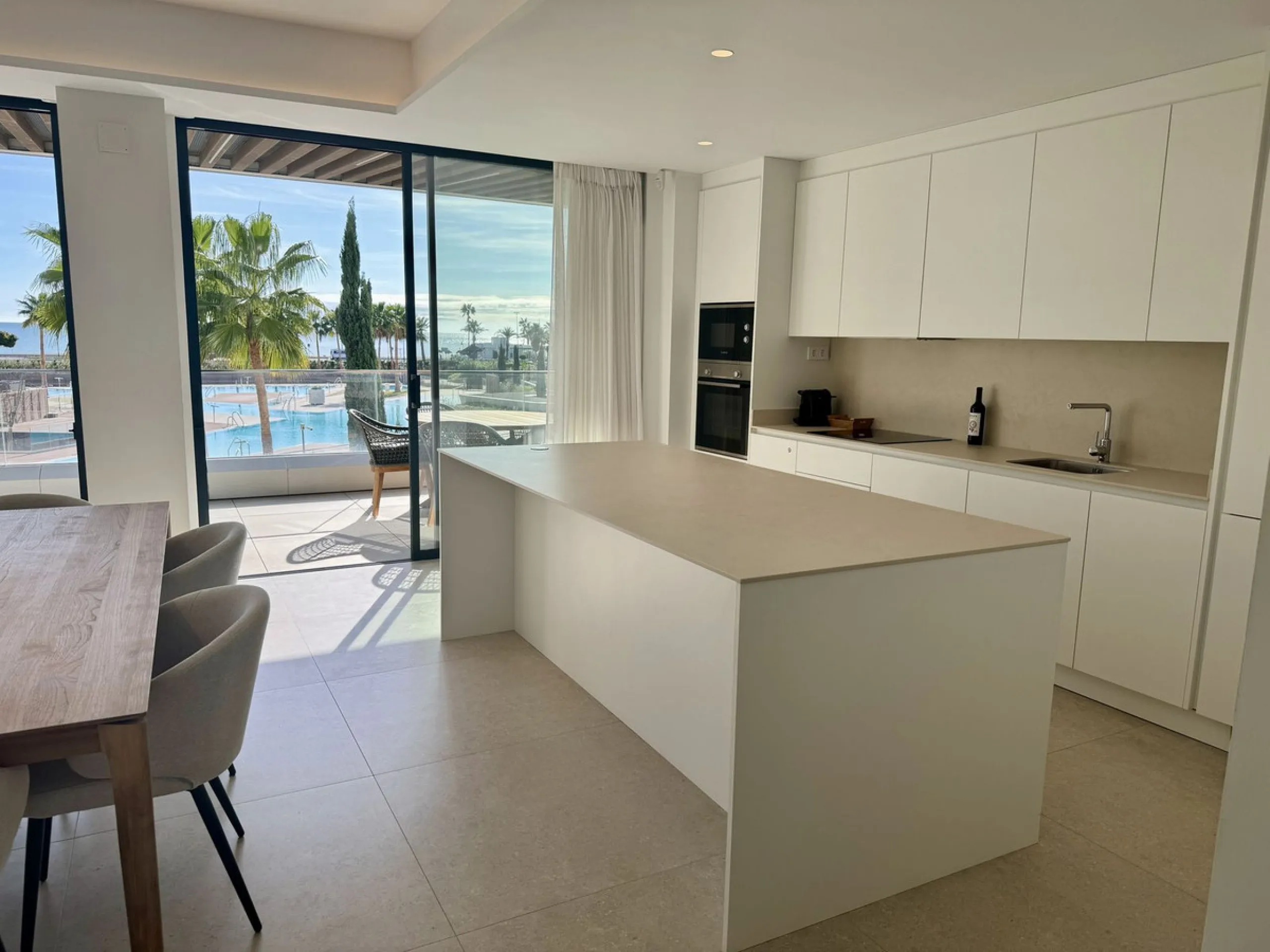 This luxurious beachfront apartment combines modern design with high-end amenities, making it an exceptional choice for coastal living. With its southeast orientation, the property enjoys abundant natural light and offers stunning, unobstructed views of t