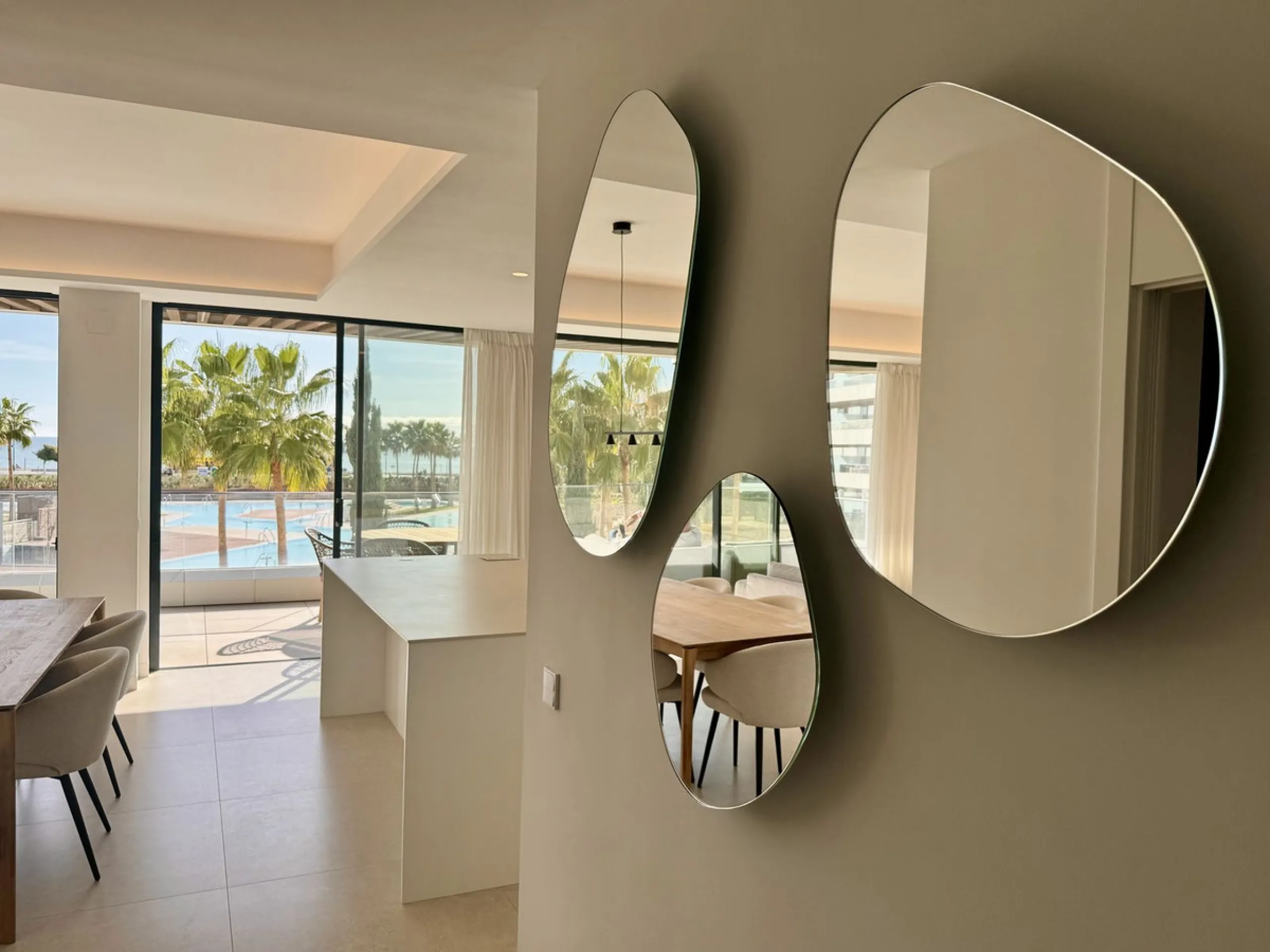 This luxurious beachfront apartment combines modern design with high-end amenities, making it an exceptional choice for coastal living. With its southeast orientation, the property enjoys abundant natural light and offers stunning, unobstructed views of t