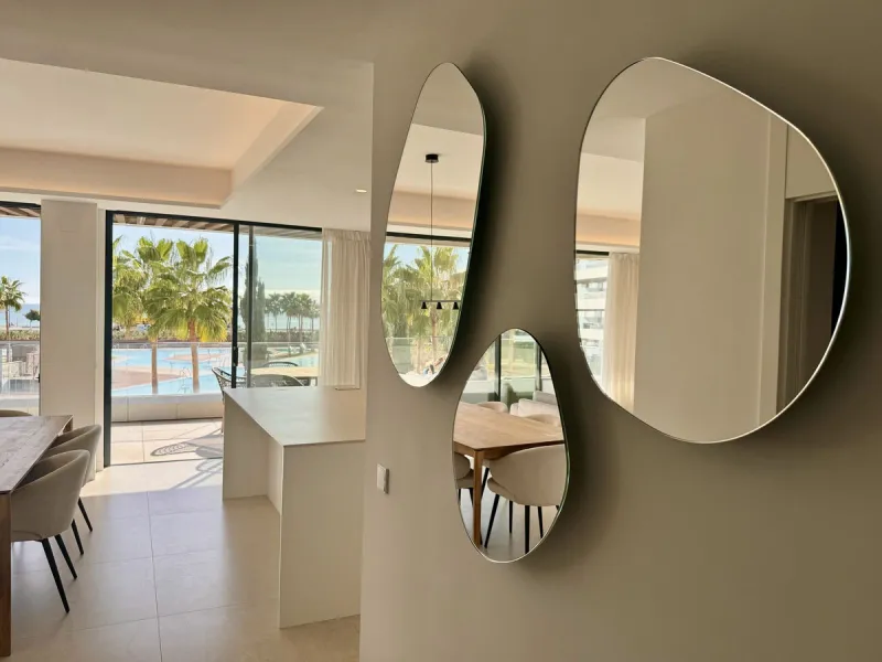 This luxurious beachfront apartment combines modern design with high-end amenities, making it an exceptional choice for coastal living. With its southeast orientation, the property enjoys abundant natural light and offers stunning, unobstructed views of t