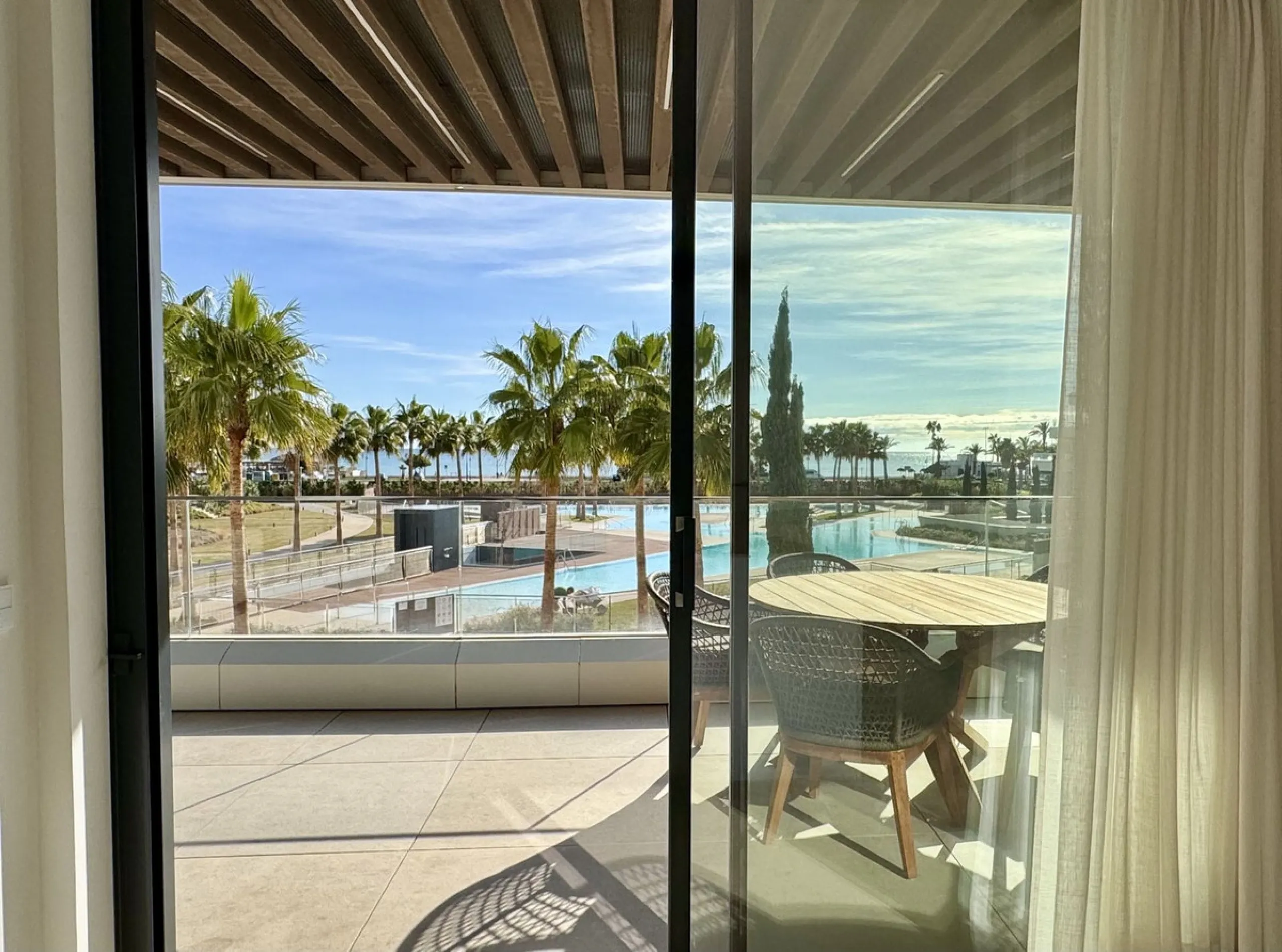 This luxurious beachfront apartment combines modern design with high-end amenities, making it an exceptional choice for coastal living. With its southeast orientation, the property enjoys abundant natural light and offers stunning, unobstructed views of t