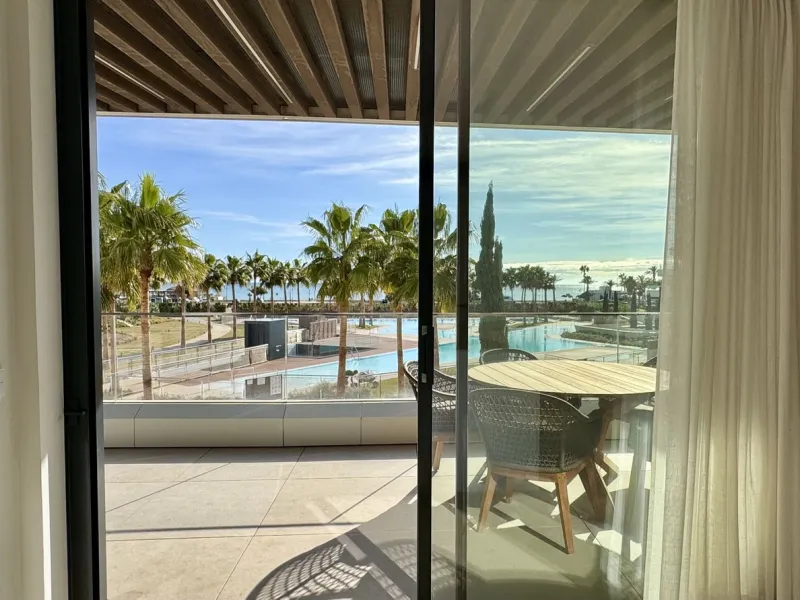 This luxurious beachfront apartment combines modern design with high-end amenities, making it an exceptional choice for coastal living. With its southeast orientation, the property enjoys abundant natural light and offers stunning, unobstructed views of t