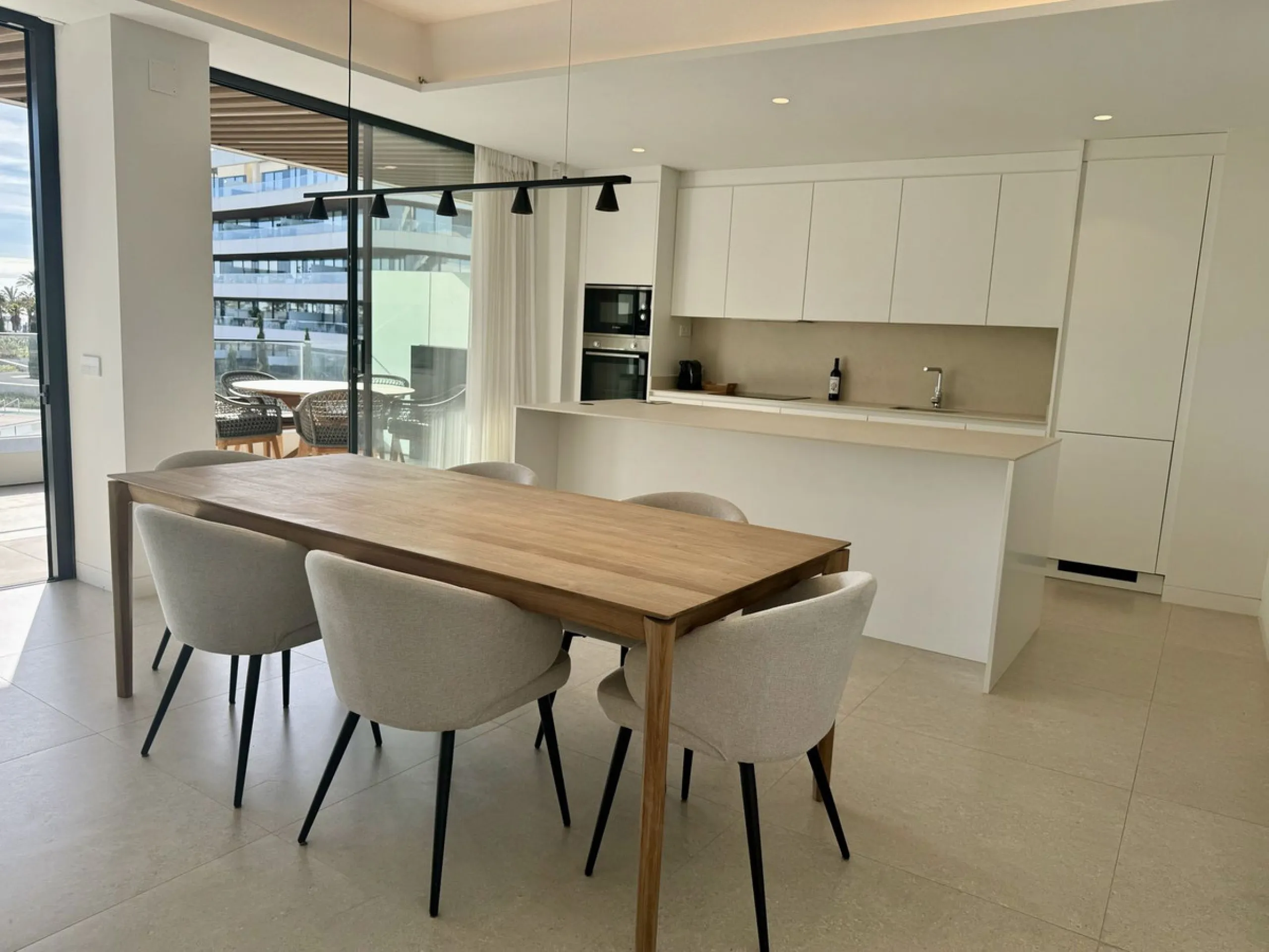 This luxurious beachfront apartment combines modern design with high-end amenities, making it an exceptional choice for coastal living. With its southeast orientation, the property enjoys abundant natural light and offers stunning, unobstructed views of t
