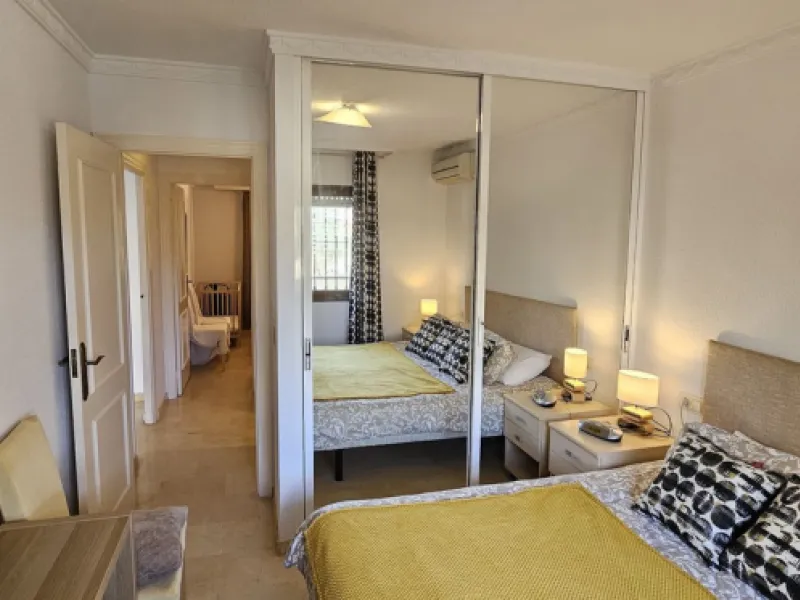 It is located in a beautiful residential area close to everything. The property has very well maintained gardens and a communal swimming pool. The beach, restaurants, supermarkets… All amenities are within walking distance.