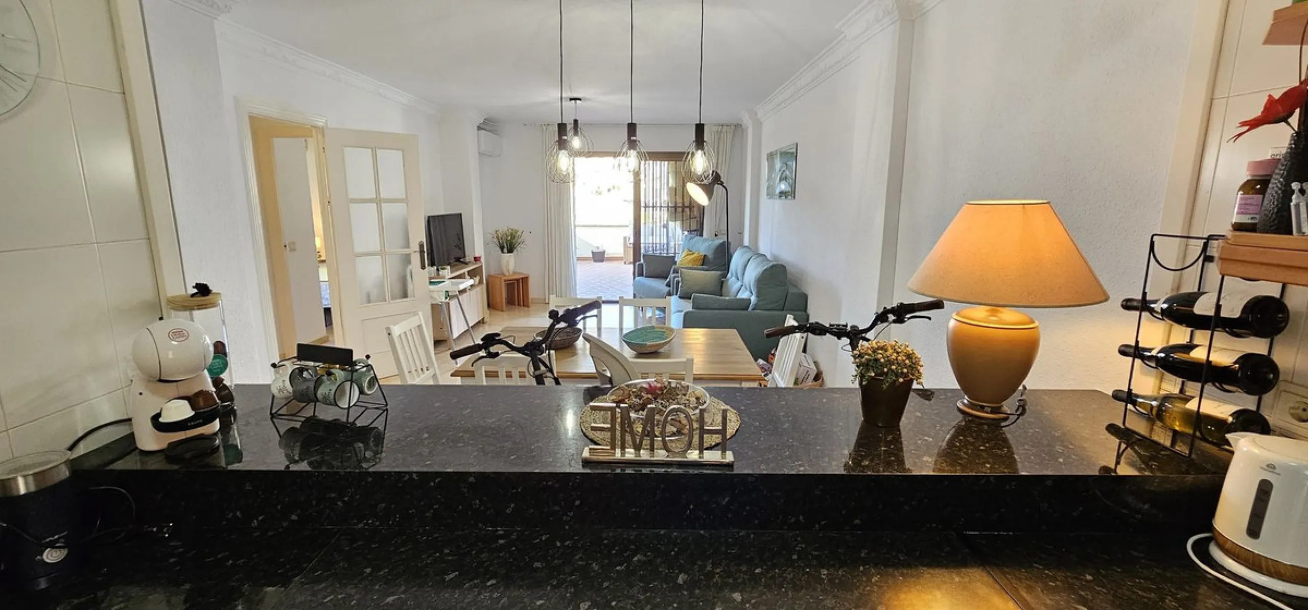 It is located in a beautiful residential area close to everything. The property has very well maintained gardens and a communal swimming pool. The beach, restaurants, supermarkets… All amenities are within walking distance.