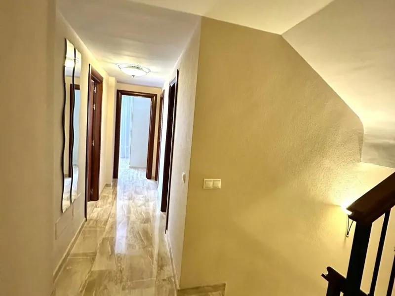 Impressive and spacious townhouse with idyllic valley views, located in the popular area of Calahonda , in a walking distance from the amenities.The townhouse is distributed on 3 floors and has 4 bedrooms, 3 bathrooms, a guest WC, very spacious living roo