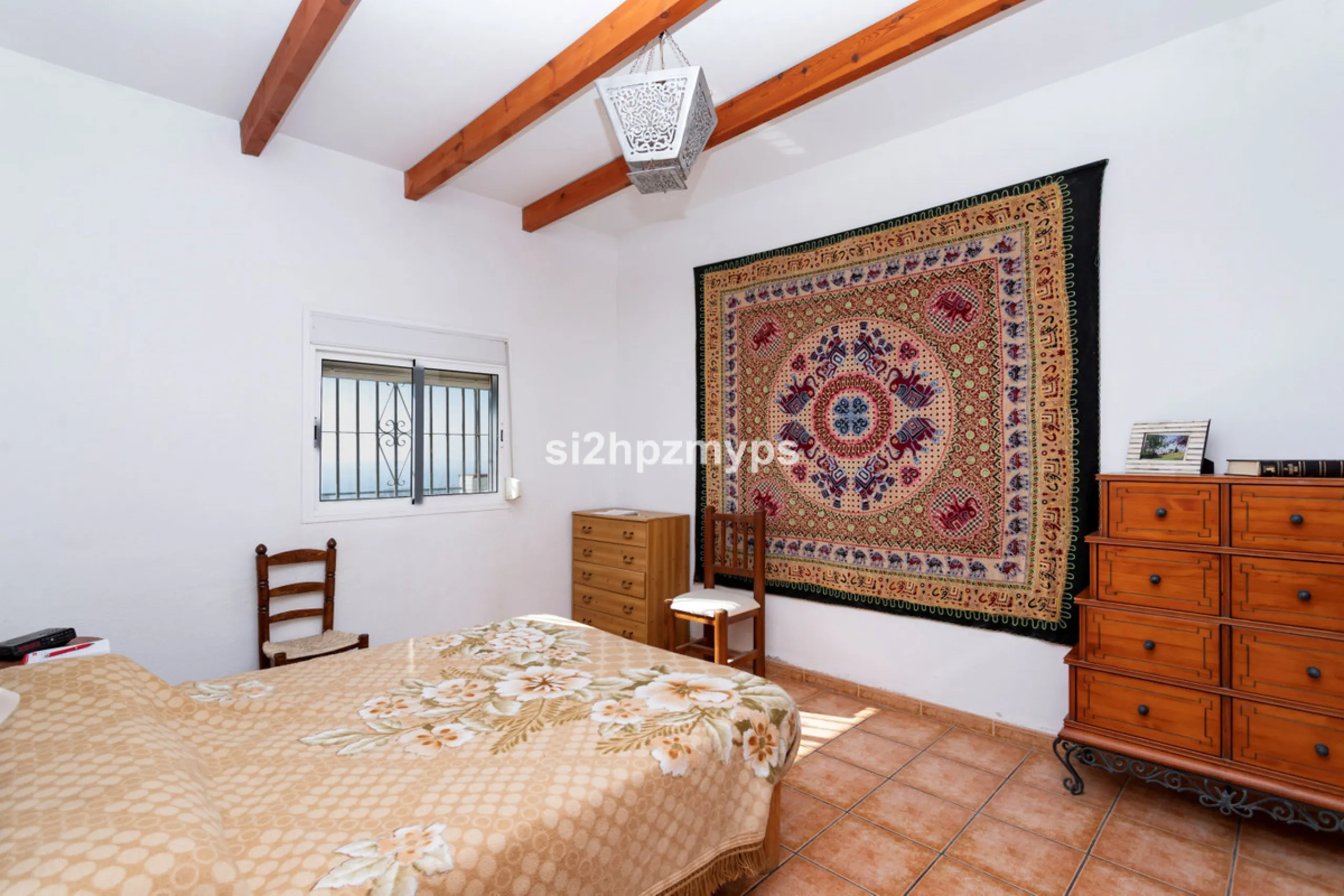 Finca with panoramic views and mango plantation Welcome to this rustic and lovely finca with 10,700 sqm of land and mango plantation located only 3 km from the beach in Lagos and 15 minutes from Torrox Costa via a road in good condition.