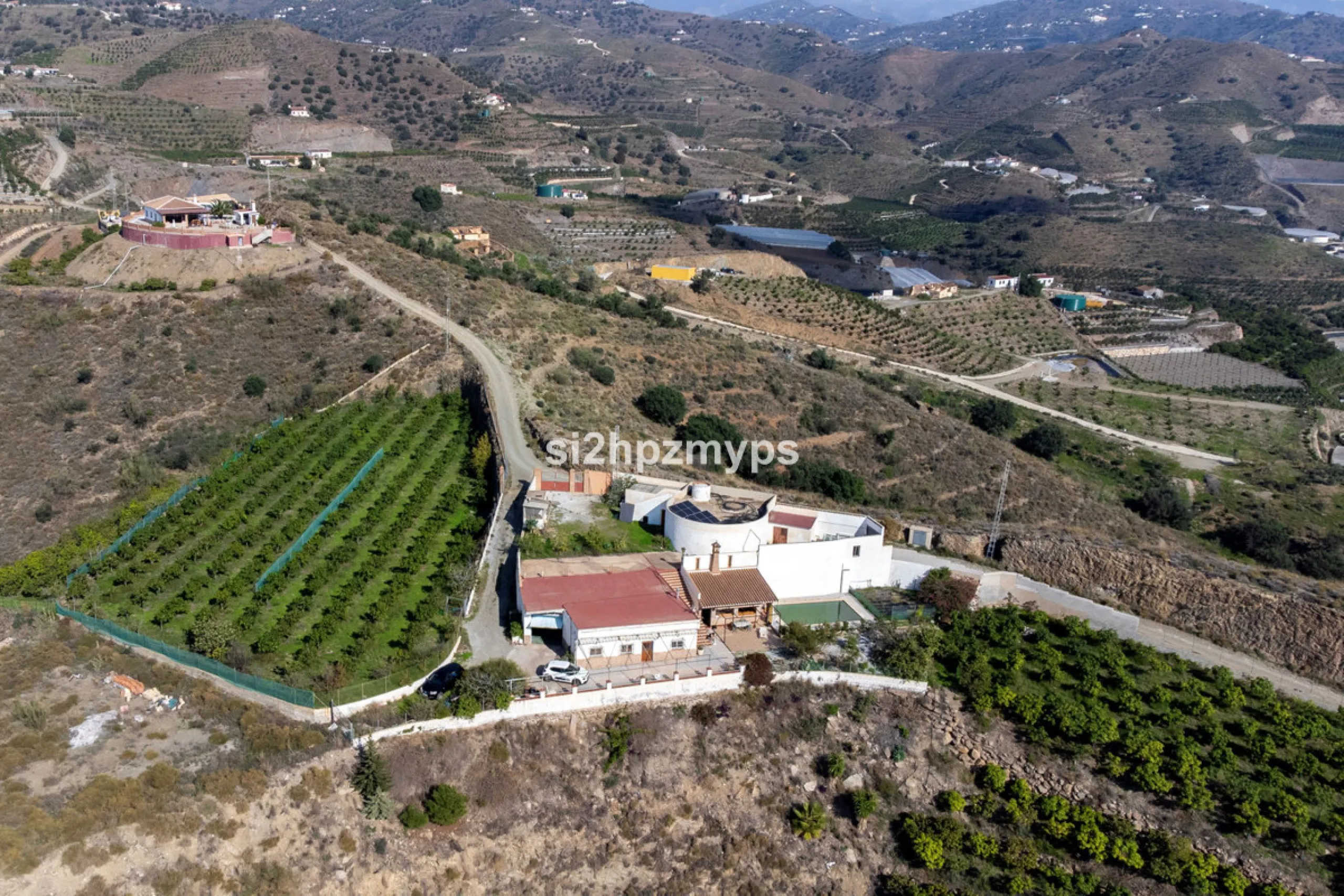 Finca with panoramic views and mango plantation Welcome to this rustic and lovely finca with 10,700 sqm of land and mango plantation located only 3 km from the beach in Lagos and 15 minutes from Torrox Costa via a road in good condition.