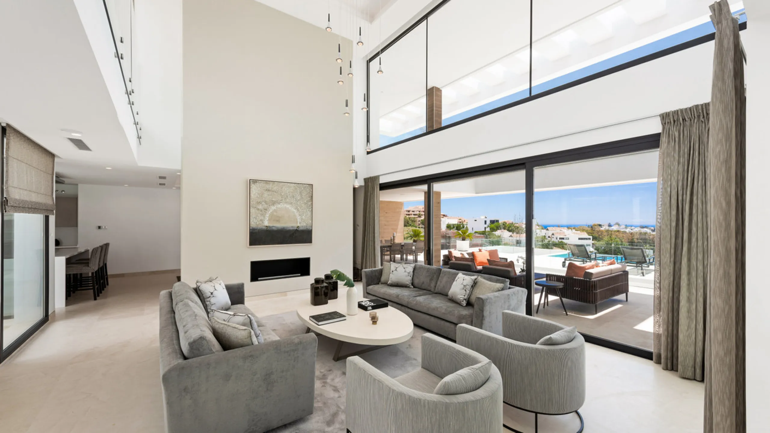 Discover a stunning luxury villa located in the highly sought-after area of La Alquería, Benahavis, offering both exclusivity and convenience. This elegant five-bedroom, five-bathroom residence is ideally situated, with Puerto Banús and Marbella just a sh