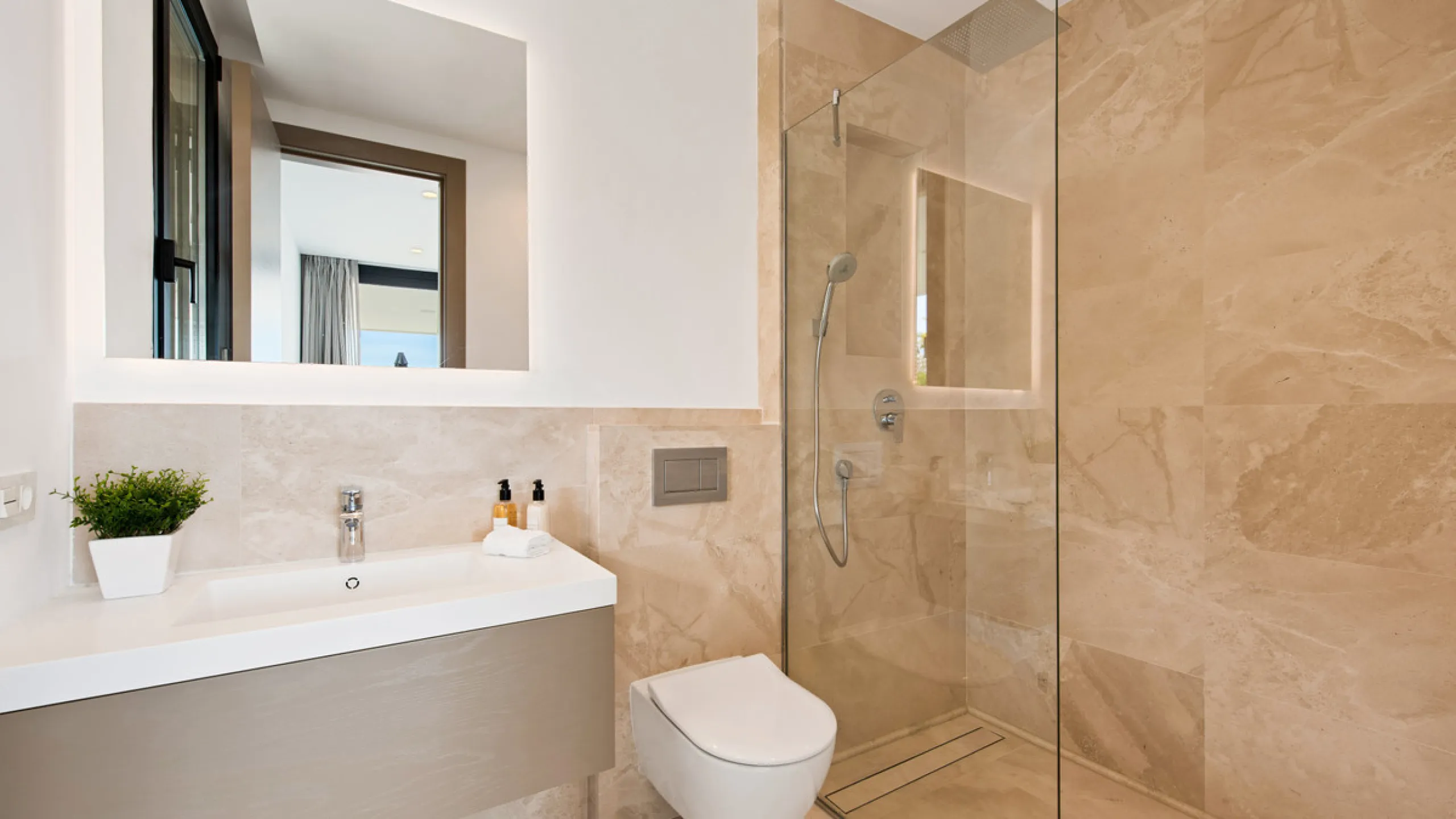 Discover a stunning luxury villa located in the highly sought-after area of La Alquería, Benahavis, offering both exclusivity and convenience. This elegant five-bedroom, five-bathroom residence is ideally situated, with Puerto Banús and Marbella just a sh
