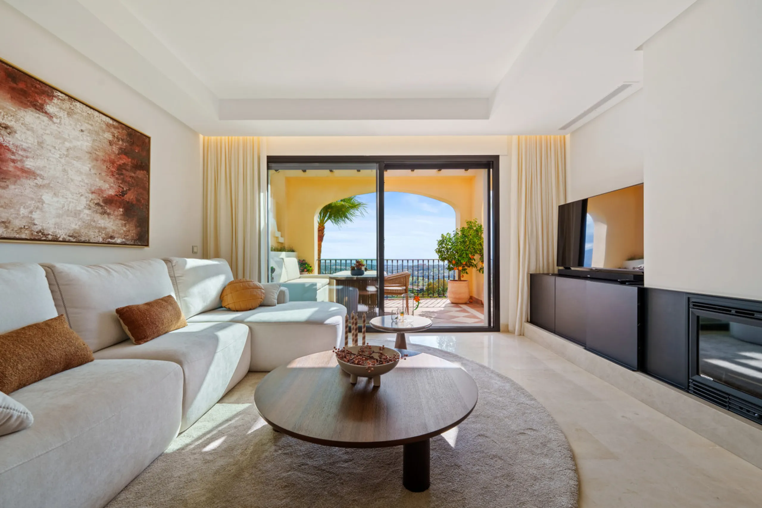 Discover the epitome of luxury living with this exceptional penthouse in Buenavista, La Quinta, perfectly situated to enjoy panoramic views of the sea, mountains and surrounding golf greens. This prime residence features terraces designed for all-season u