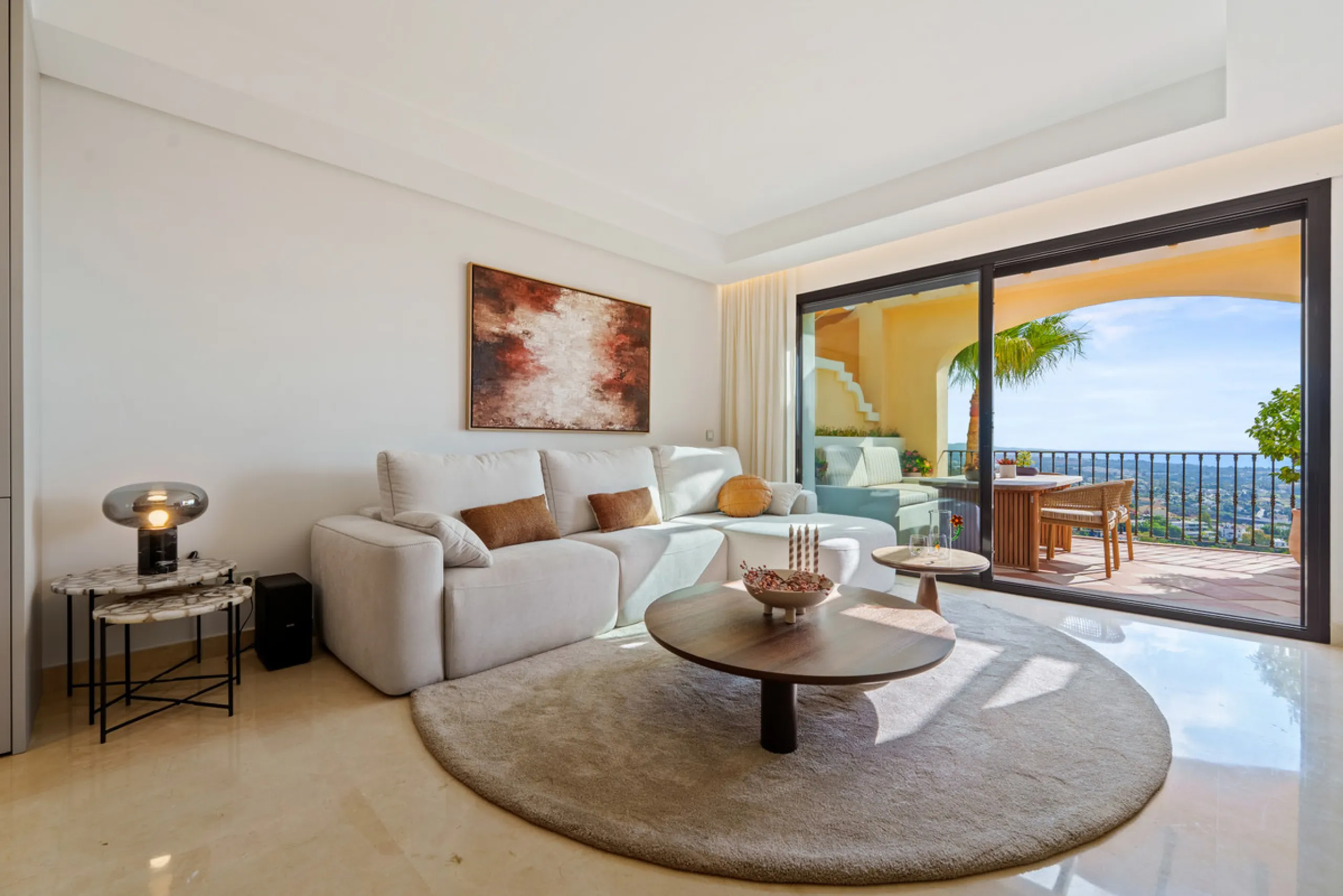 Discover the epitome of luxury living with this exceptional penthouse in Buenavista, La Quinta, perfectly situated to enjoy panoramic views of the sea, mountains and surrounding golf greens. This prime residence features terraces designed for all-season u