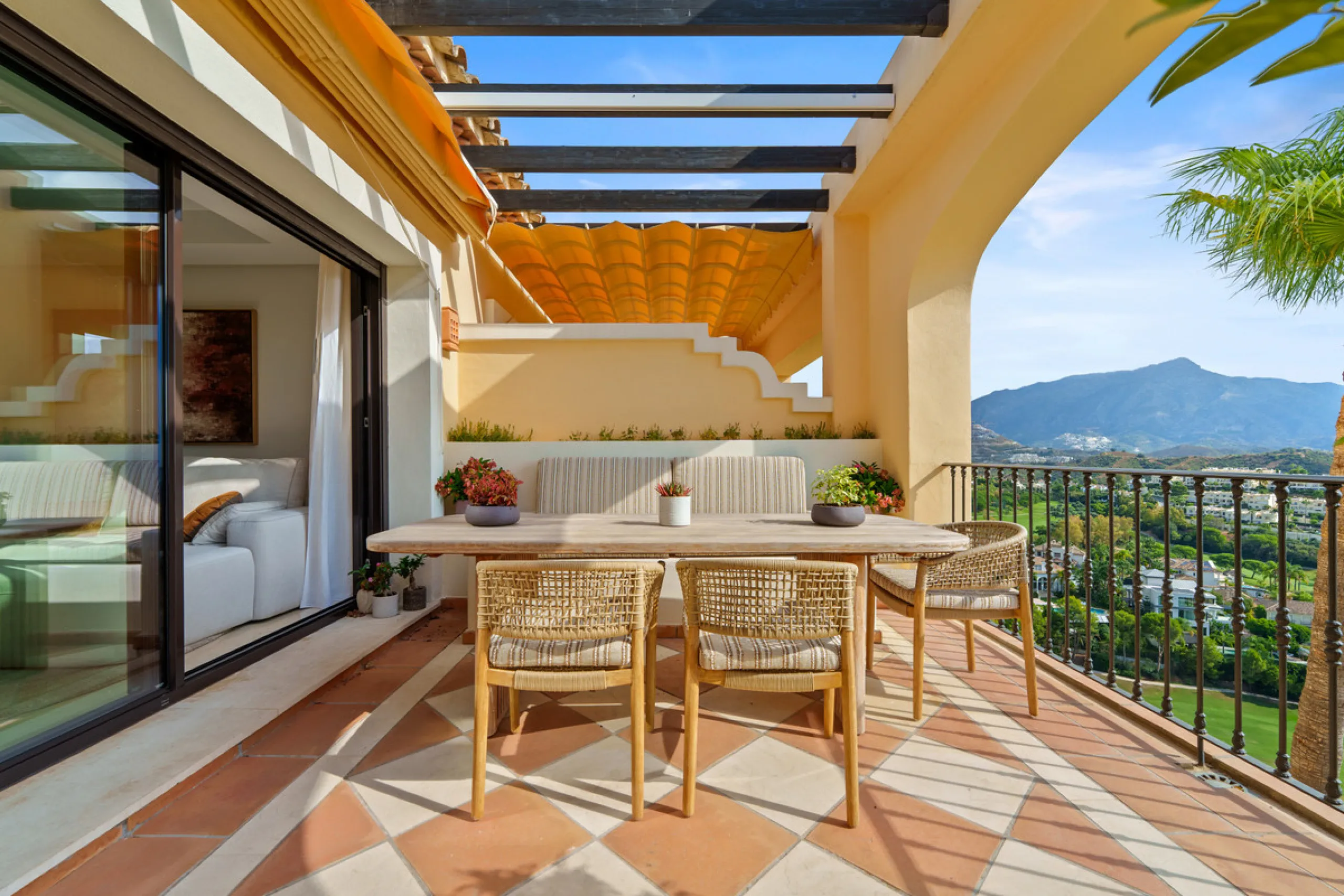 Discover the epitome of luxury living with this exceptional penthouse in Buenavista, La Quinta, perfectly situated to enjoy panoramic views of the sea, mountains and surrounding golf greens. This prime residence features terraces designed for all-season u