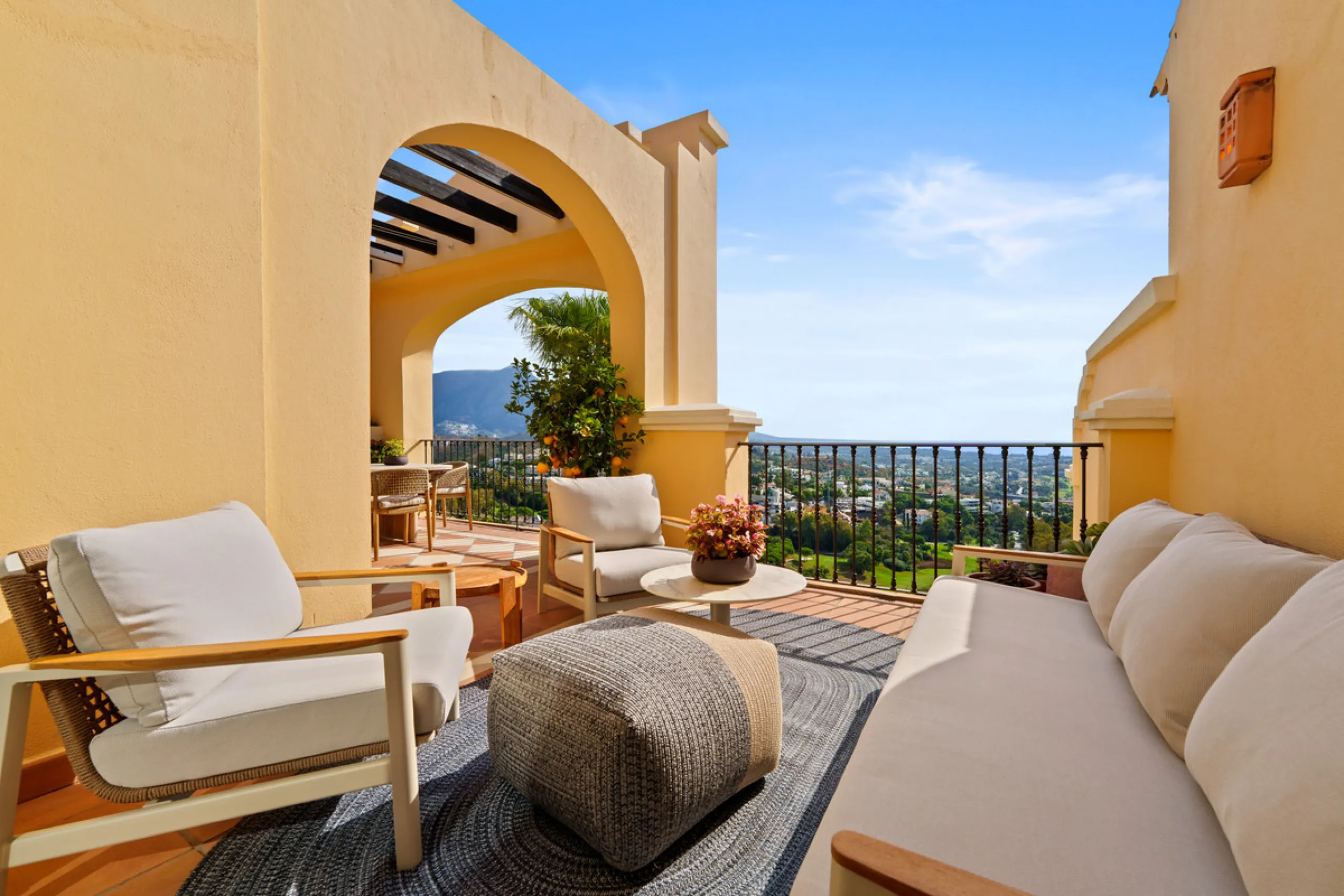 Discover the epitome of luxury living with this exceptional penthouse in Buenavista, La Quinta, perfectly situated to enjoy panoramic views of the sea, mountains and surrounding golf greens. This prime residence features terraces designed for all-season u