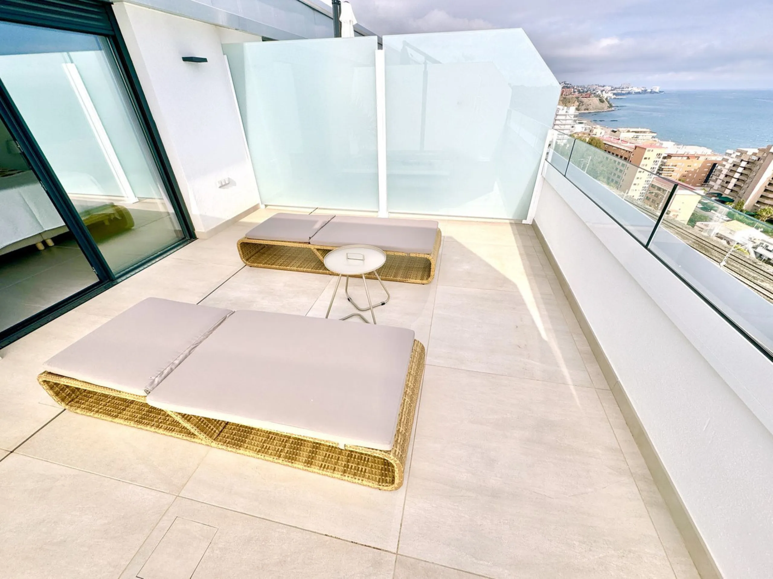 REDUCED - Stunning 2 bed duplex Penthouse only 100m to beach, shops & restaurants, with breathtaking 180º Mediterranean sea views. Set in exclusive El Higueron luxury Sports / Spa community with own beach Club.