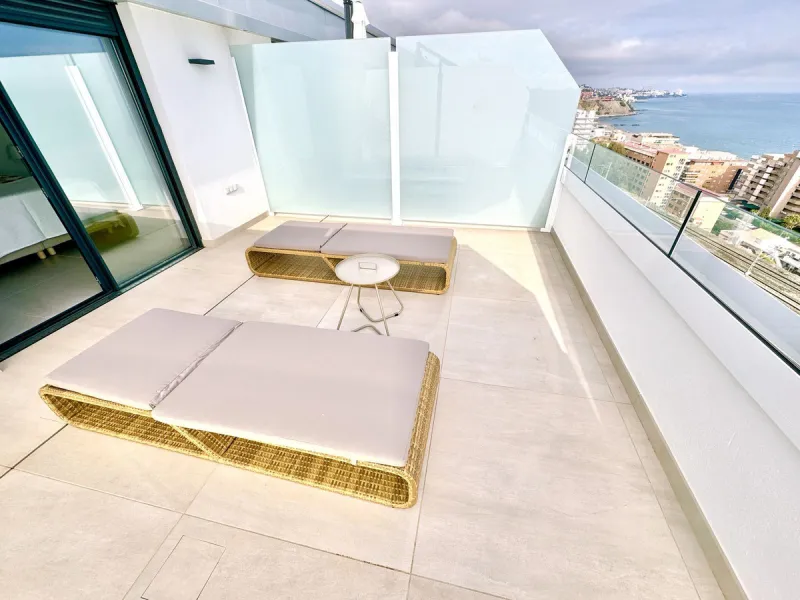 REDUCED - Stunning 2 bed duplex Penthouse only 100m to beach, shops & restaurants, with breathtaking 180º Mediterranean sea views. Set in exclusive El Higueron luxury Sports / Spa community with own beach Club.