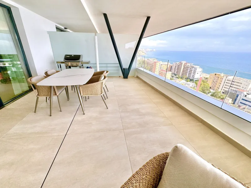 REDUCED - Stunning 2 bed duplex Penthouse only 100m to beach, shops & restaurants, with breathtaking 180º Mediterranean sea views. Set in exclusive El Higueron luxury Sports / Spa community with own beach Club.