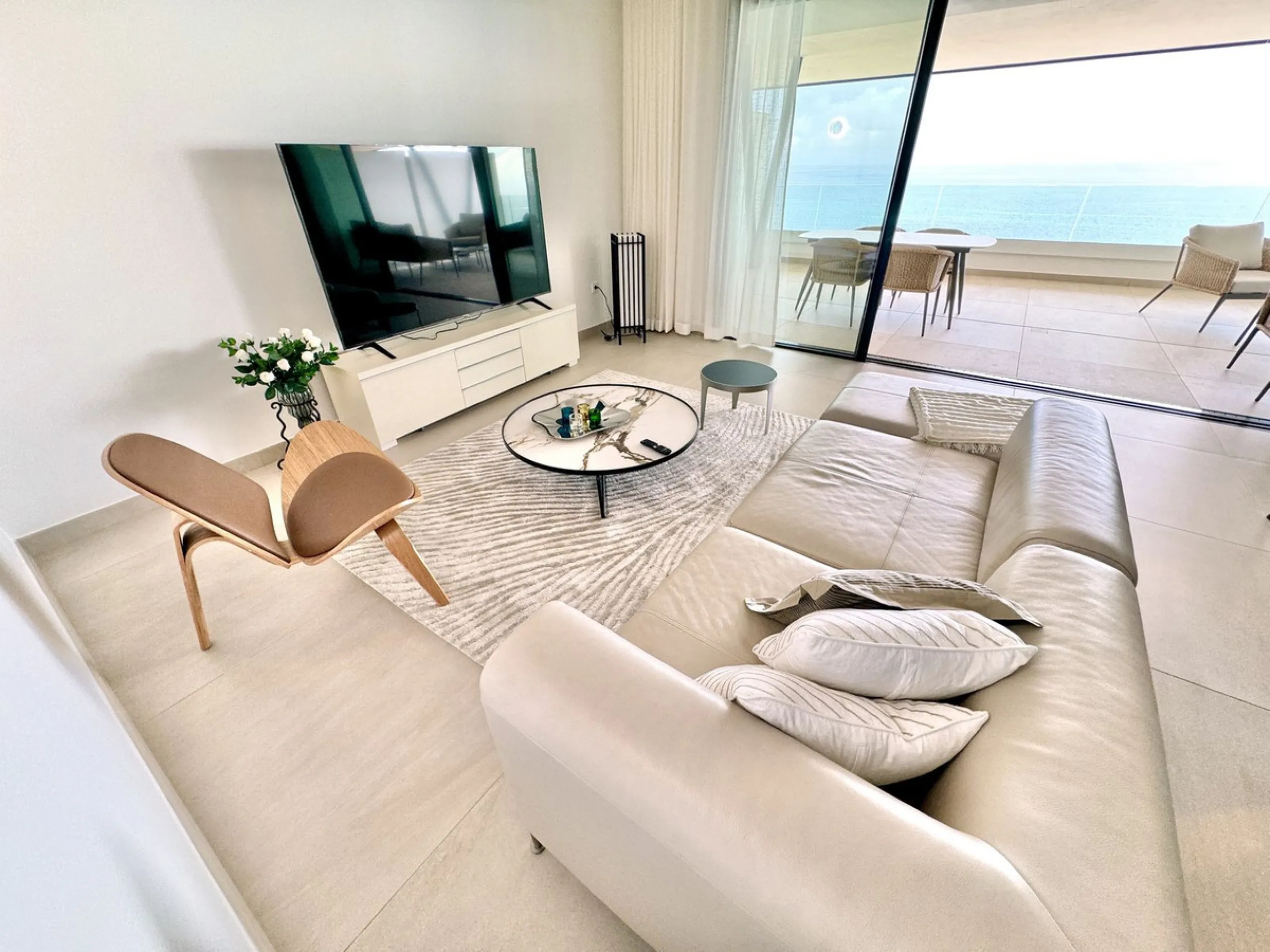 REDUCED - Stunning 2 bed duplex Penthouse only 100m to beach, shops & restaurants, with breathtaking 180º Mediterranean sea views. Set in exclusive El Higueron luxury Sports / Spa community with own beach Club.