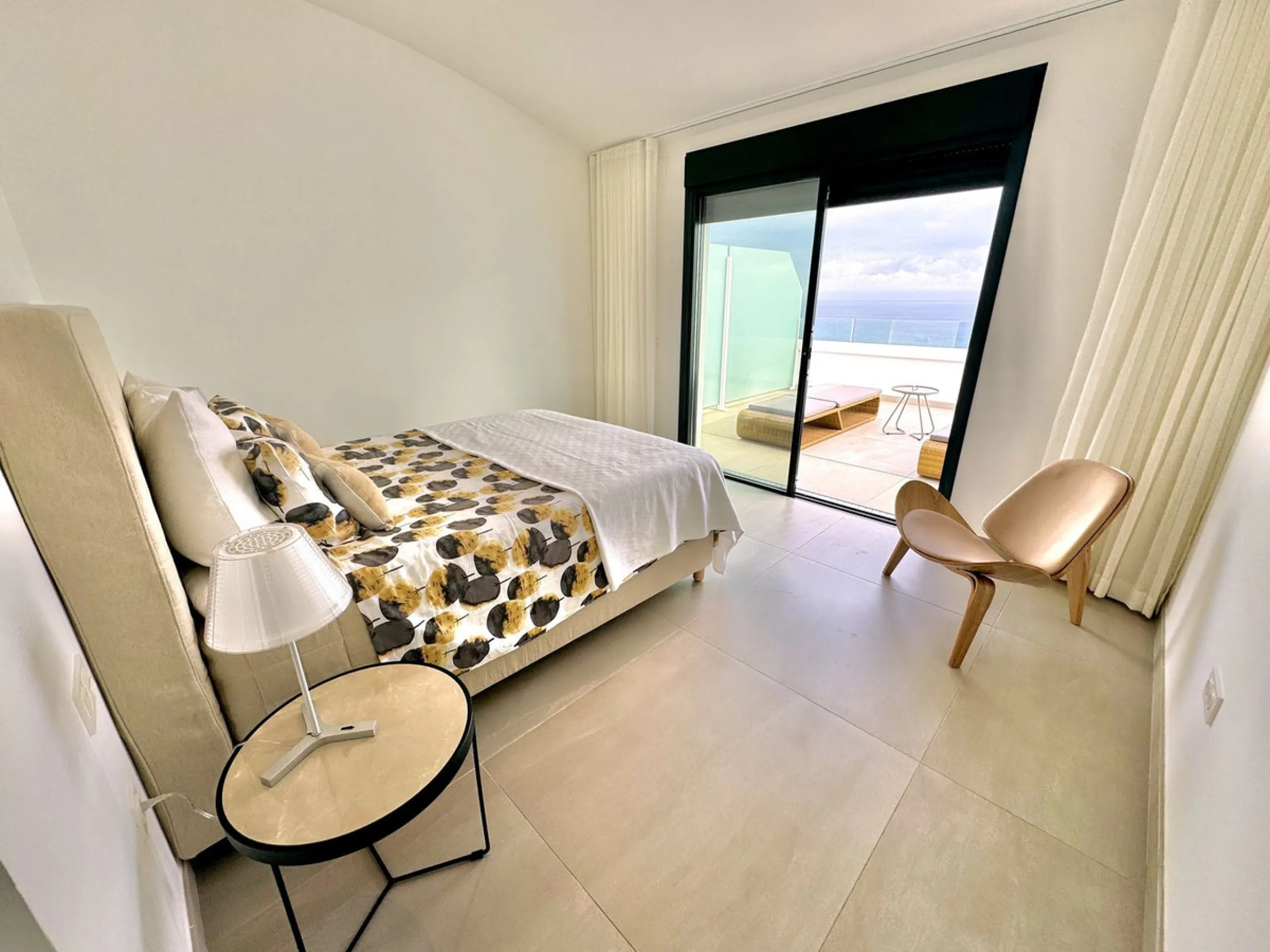 REDUCED - Stunning 2 bed duplex Penthouse only 100m to beach, shops & restaurants, with breathtaking 180º Mediterranean sea views. Set in exclusive El Higueron luxury Sports / Spa community with own beach Club.