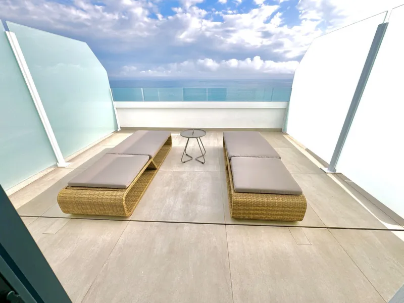 REDUCED - Stunning 2 bed duplex Penthouse only 100m to beach, shops & restaurants, with breathtaking 180º Mediterranean sea views. Set in exclusive El Higueron luxury Sports / Spa community with own beach Club.