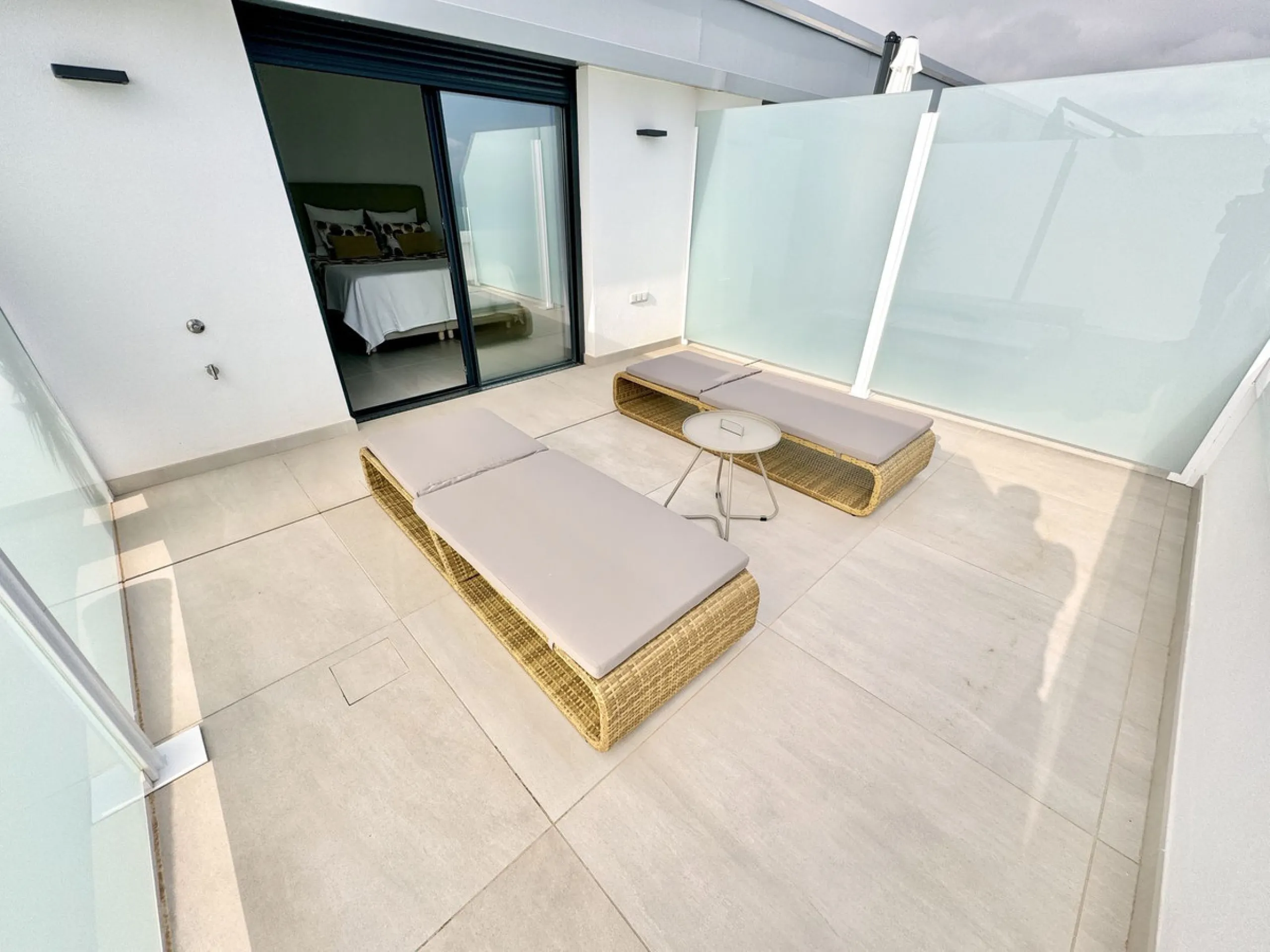 REDUCED - Stunning 2 bed duplex Penthouse only 100m to beach, shops & restaurants, with breathtaking 180º Mediterranean sea views. Set in exclusive El Higueron luxury Sports / Spa community with own beach Club.