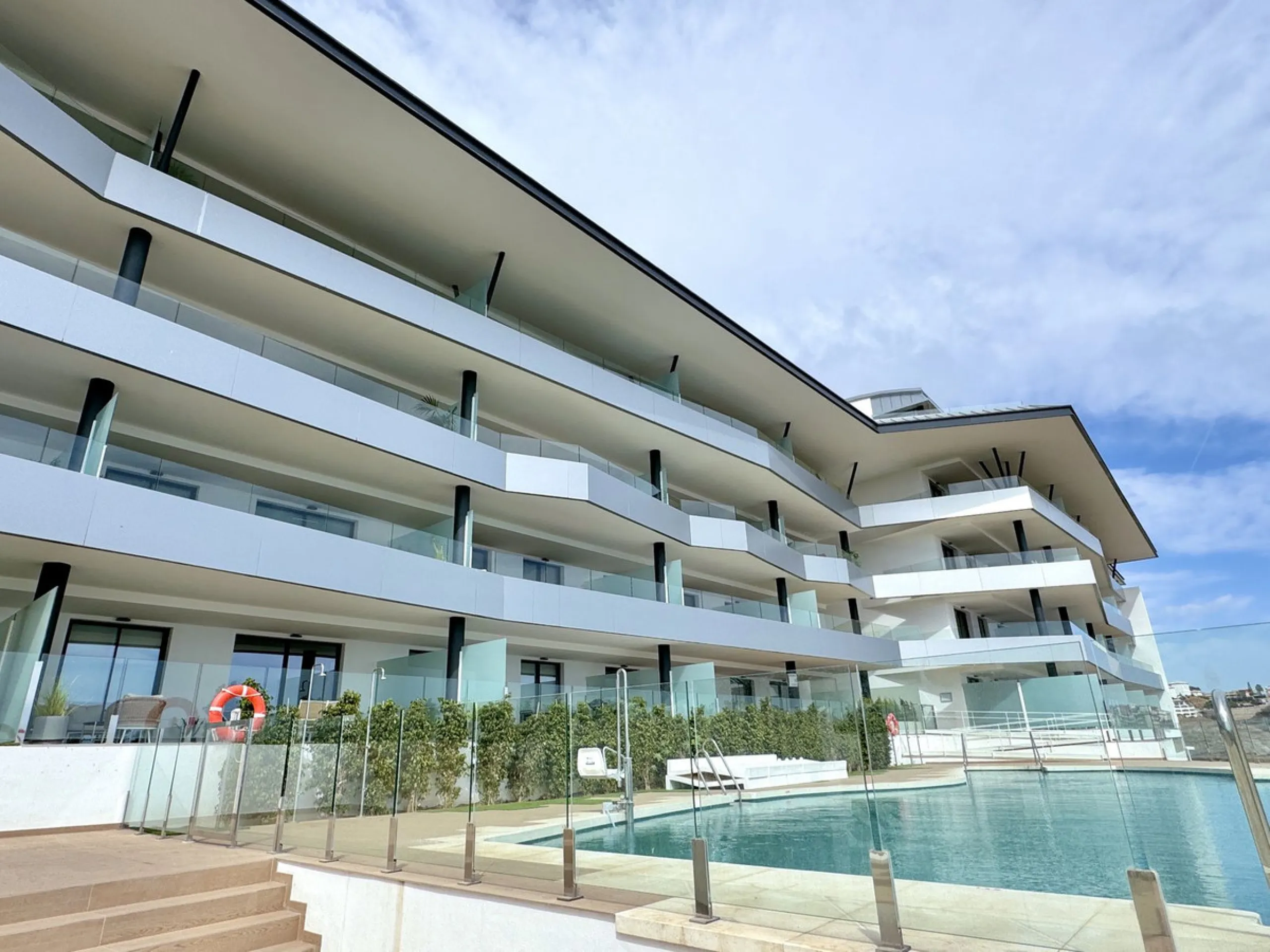 REDUCED - Stunning 2 bed duplex Penthouse only 100m to beach, shops & restaurants, with breathtaking 180º Mediterranean sea views. Set in exclusive El Higueron luxury Sports / Spa community with own beach Club.