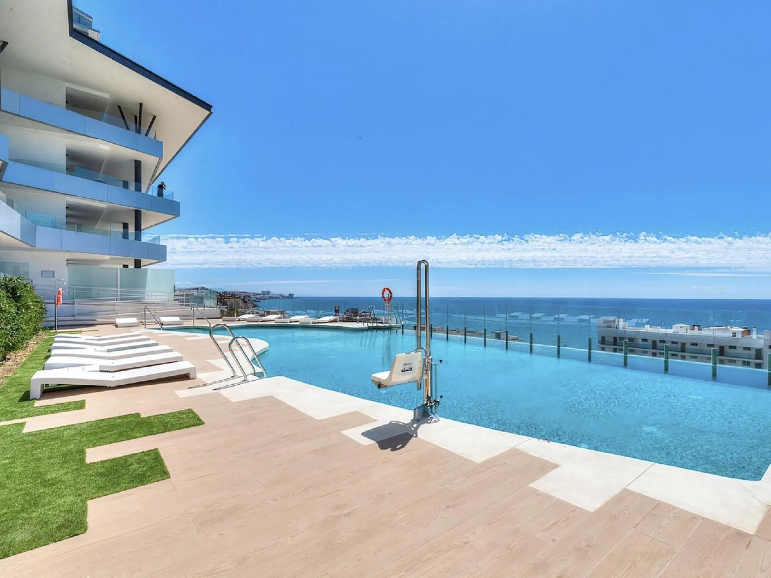 REDUCED - Stunning 2 bed duplex Penthouse only 100m to beach, shops & restaurants, with breathtaking 180º Mediterranean sea views. Set in exclusive El Higueron luxury Sports / Spa community with own beach Club.