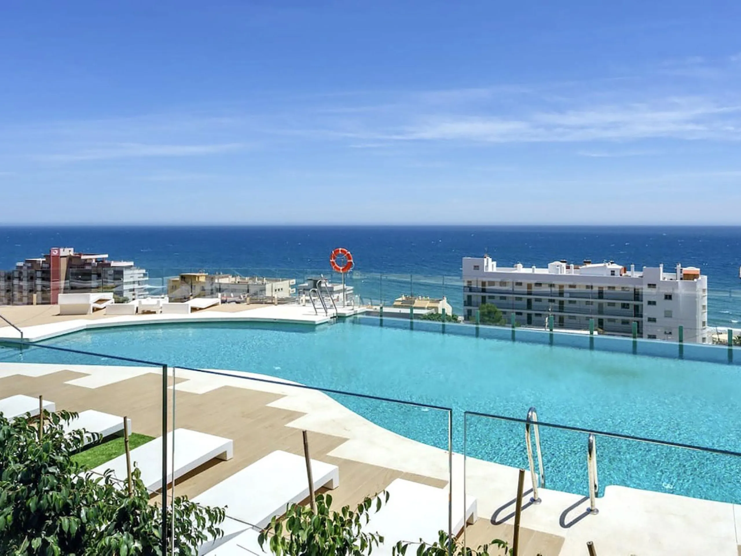 REDUCED - Stunning 2 bed duplex Penthouse only 100m to beach, shops & restaurants, with breathtaking 180º Mediterranean sea views. Set in exclusive El Higueron luxury Sports / Spa community with own beach Club.