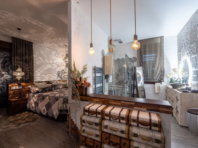 Villa TrueLove is a six-bedroom, five-bathroom luxury villa in the heart of Benahavís. It offers stunning mountain and garden views, combining modern technology with natural design. The home features a seamless connection between indoor and outdoor living