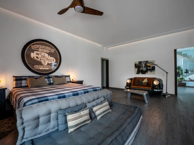 Villa TrueLove is a six-bedroom, five-bathroom luxury villa in the heart of Benahavís. It offers stunning mountain and garden views, combining modern technology with natural design. The home features a seamless connection between indoor and outdoor living