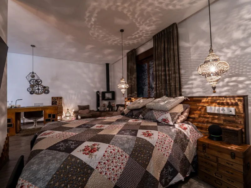 Villa TrueLove is a six-bedroom, five-bathroom luxury villa in the heart of Benahavís. It offers stunning mountain and garden views, combining modern technology with natural design. The home features a seamless connection between indoor and outdoor living