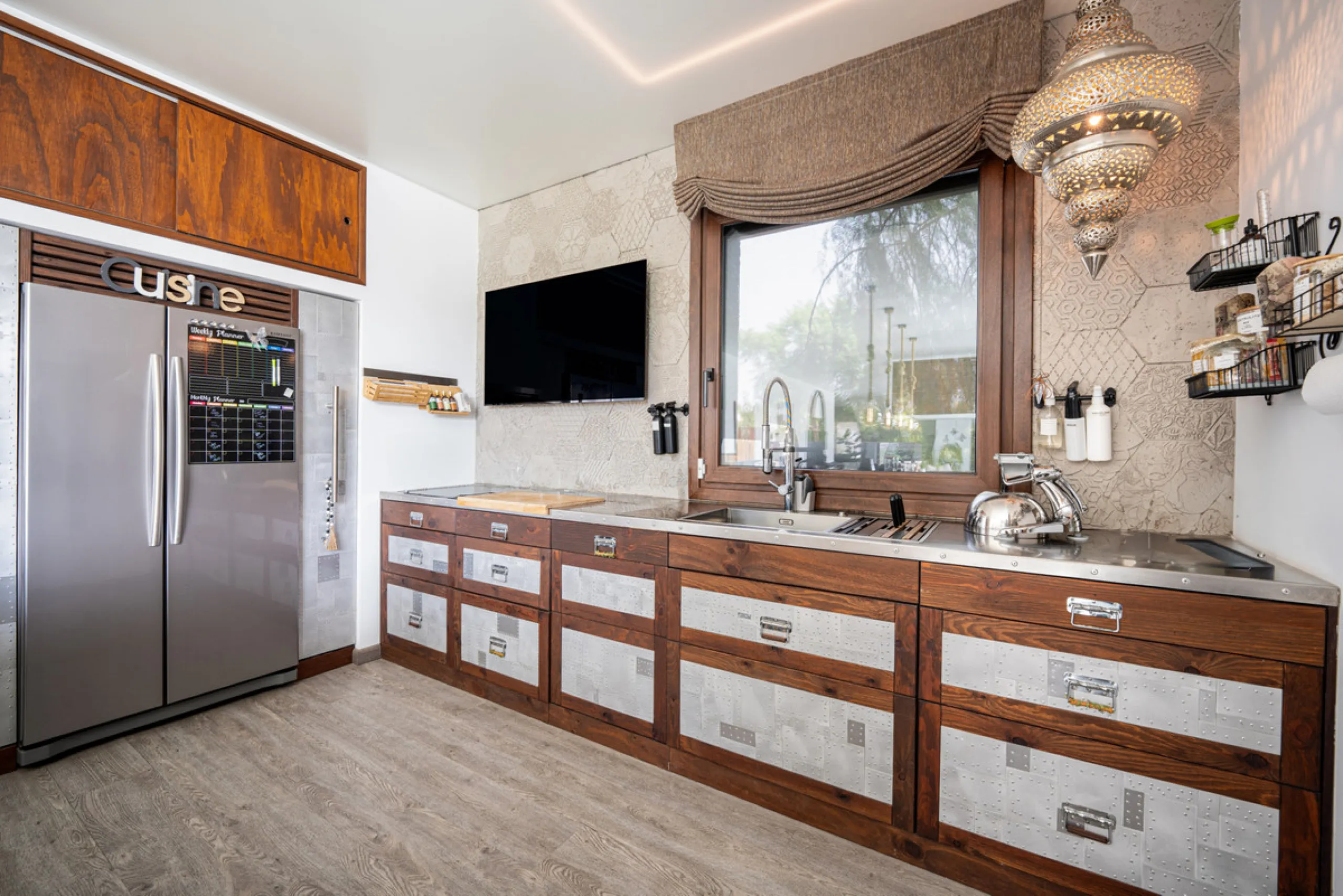 Villa TrueLove is a six-bedroom, five-bathroom luxury villa in the heart of Benahavís. It offers stunning mountain and garden views, combining modern technology with natural design. The home features a seamless connection between indoor and outdoor living