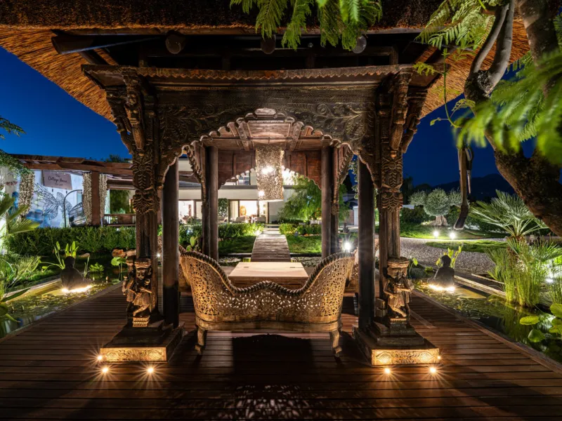 Villa TrueLove is a six-bedroom, five-bathroom luxury villa in the heart of Benahavís. It offers stunning mountain and garden views, combining modern technology with natural design. The home features a seamless connection between indoor and outdoor living