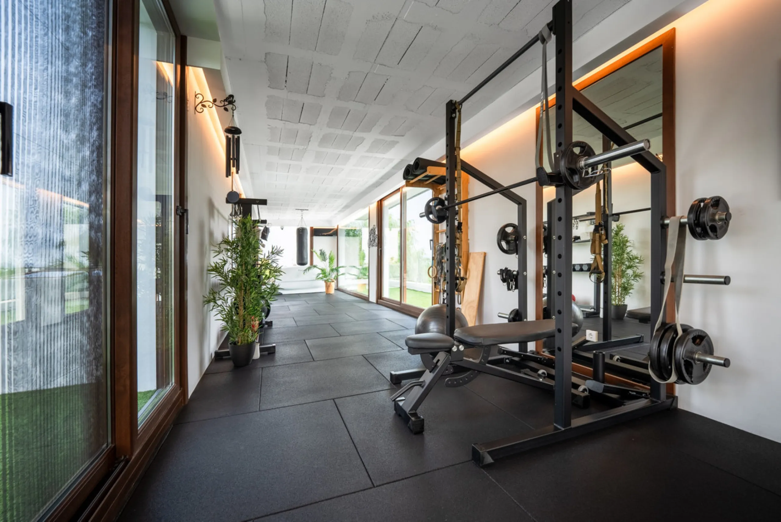 Villa TrueLove is a six-bedroom, five-bathroom luxury villa in the heart of Benahavís. It offers stunning mountain and garden views, combining modern technology with natural design. The home features a seamless connection between indoor and outdoor living