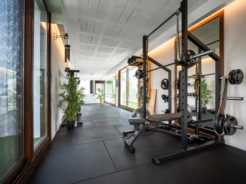 Villa TrueLove is a six-bedroom, five-bathroom luxury villa in the heart of Benahavís. It offers stunning mountain and garden views, combining modern technology with natural design. The home features a seamless connection between indoor and outdoor living
