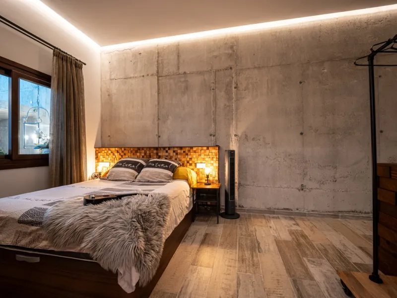 Villa TrueLove is a six-bedroom, five-bathroom luxury villa in the heart of Benahavís. It offers stunning mountain and garden views, combining modern technology with natural design. The home features a seamless connection between indoor and outdoor living