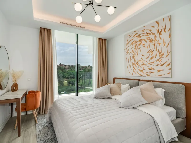 Nestled along the lush greens of Marbella's finest golf course of El Campanario, this luxurious 5-bedroom, 4.5-bath villa offers a seamless blend of elegance and state-of-the-art comfort over 460 square meters of living space. The villa's open layout invi