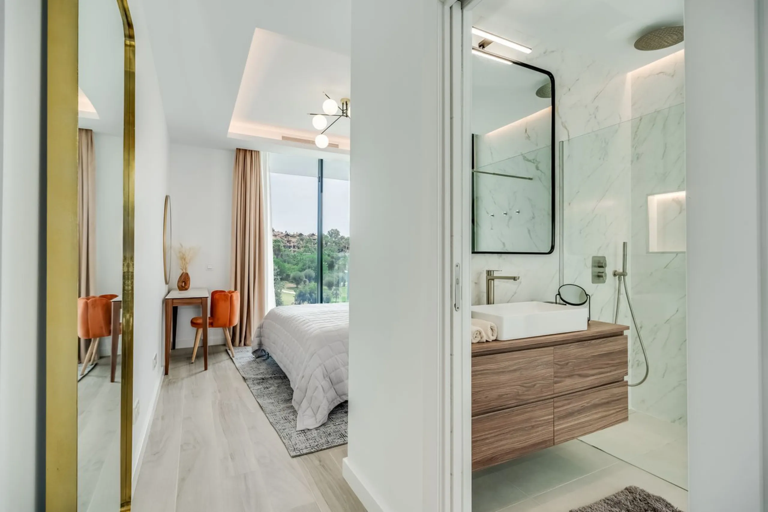 Nestled along the lush greens of Marbella's finest golf course of El Campanario, this luxurious 5-bedroom, 4.5-bath villa offers a seamless blend of elegance and state-of-the-art comfort over 460 square meters of living space. The villa's open layout invi
