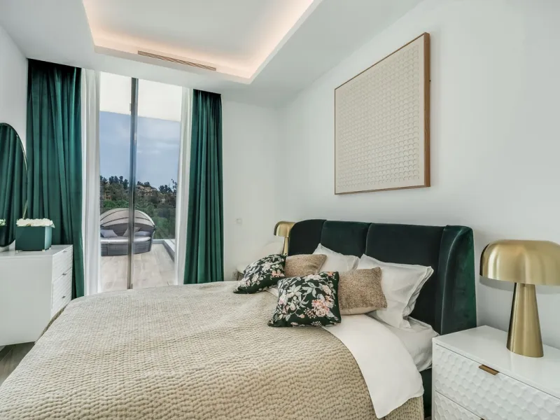 Nestled along the lush greens of Marbella's finest golf course of El Campanario, this luxurious 5-bedroom, 4.5-bath villa offers a seamless blend of elegance and state-of-the-art comfort over 460 square meters of living space. The villa's open layout invi