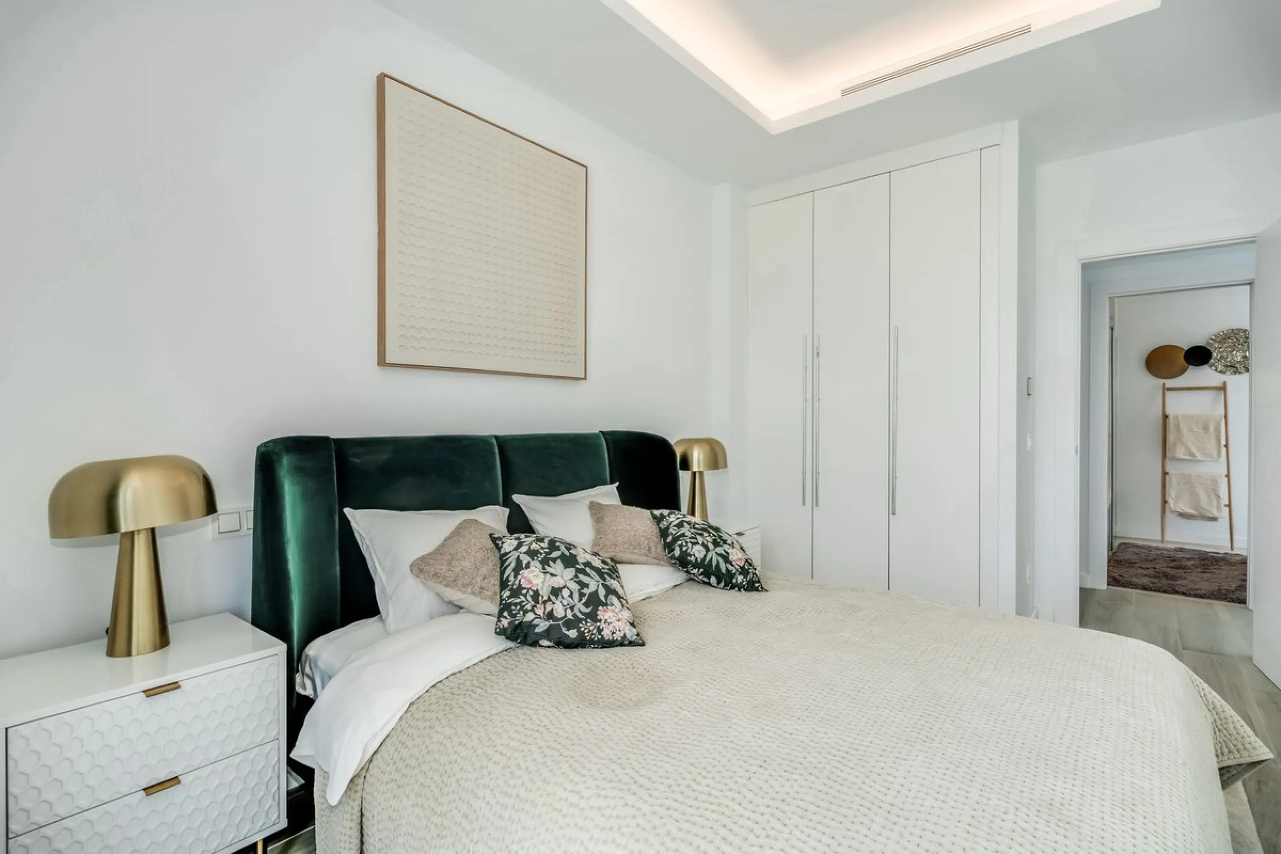 Nestled along the lush greens of Marbella's finest golf course of El Campanario, this luxurious 5-bedroom, 4.5-bath villa offers a seamless blend of elegance and state-of-the-art comfort over 460 square meters of living space. The villa's open layout invi