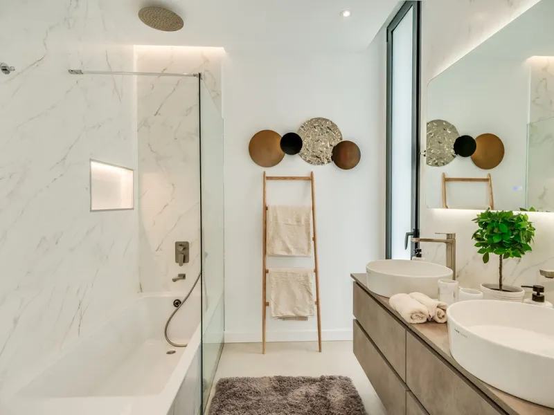 Nestled along the lush greens of Marbella's finest golf course of El Campanario, this luxurious 5-bedroom, 4.5-bath villa offers a seamless blend of elegance and state-of-the-art comfort over 460 square meters of living space. The villa's open layout invi