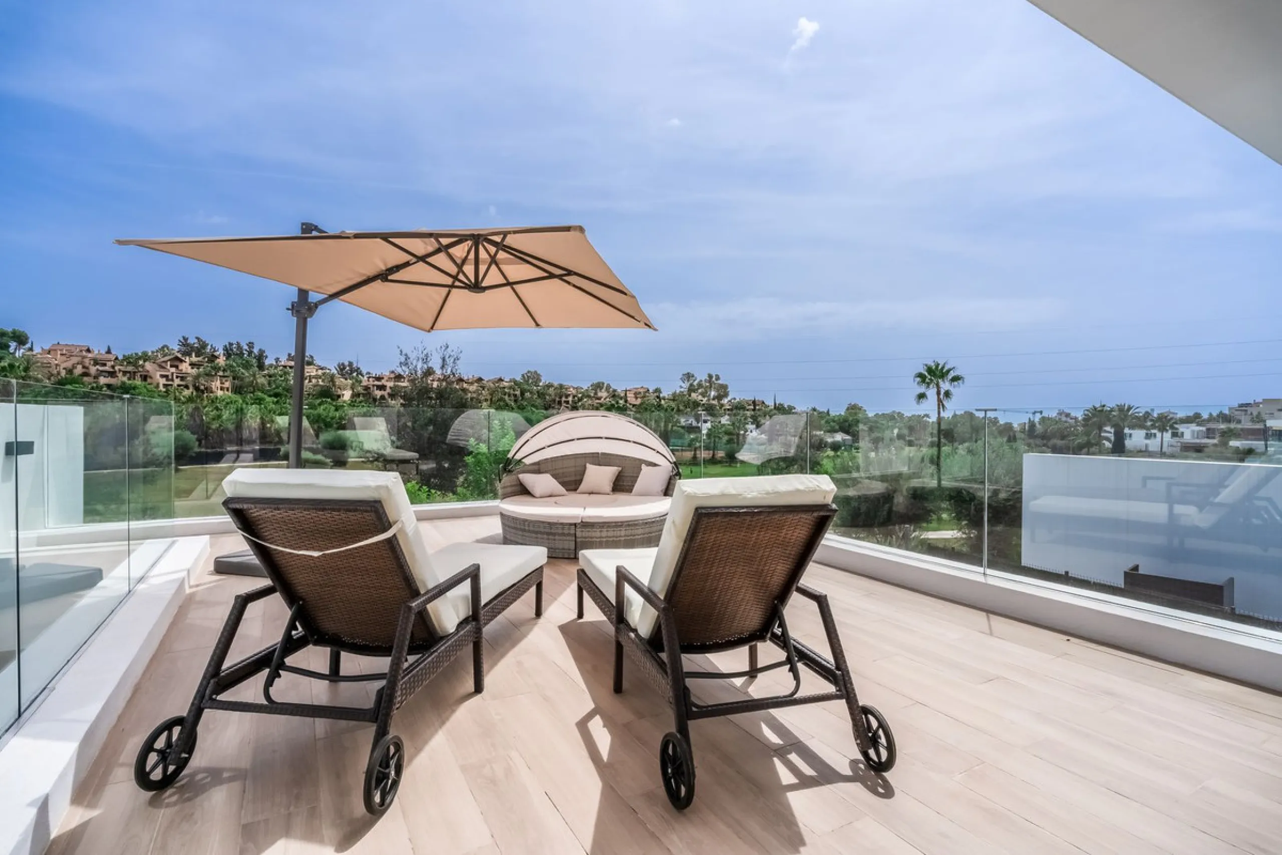 Nestled along the lush greens of Marbella's finest golf course of El Campanario, this luxurious 5-bedroom, 4.5-bath villa offers a seamless blend of elegance and state-of-the-art comfort over 460 square meters of living space. The villa's open layout invi