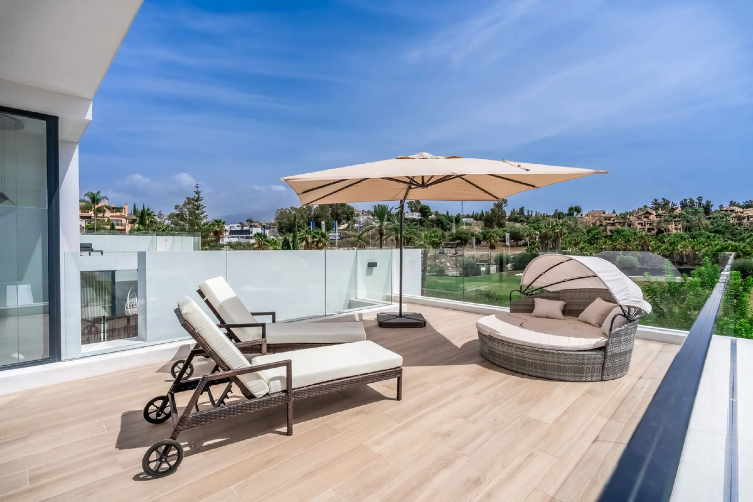 Nestled along the lush greens of Marbella's finest golf course of El Campanario, this luxurious 5-bedroom, 4.5-bath villa offers a seamless blend of elegance and state-of-the-art comfort over 460 square meters of living space. The villa's open layout invi