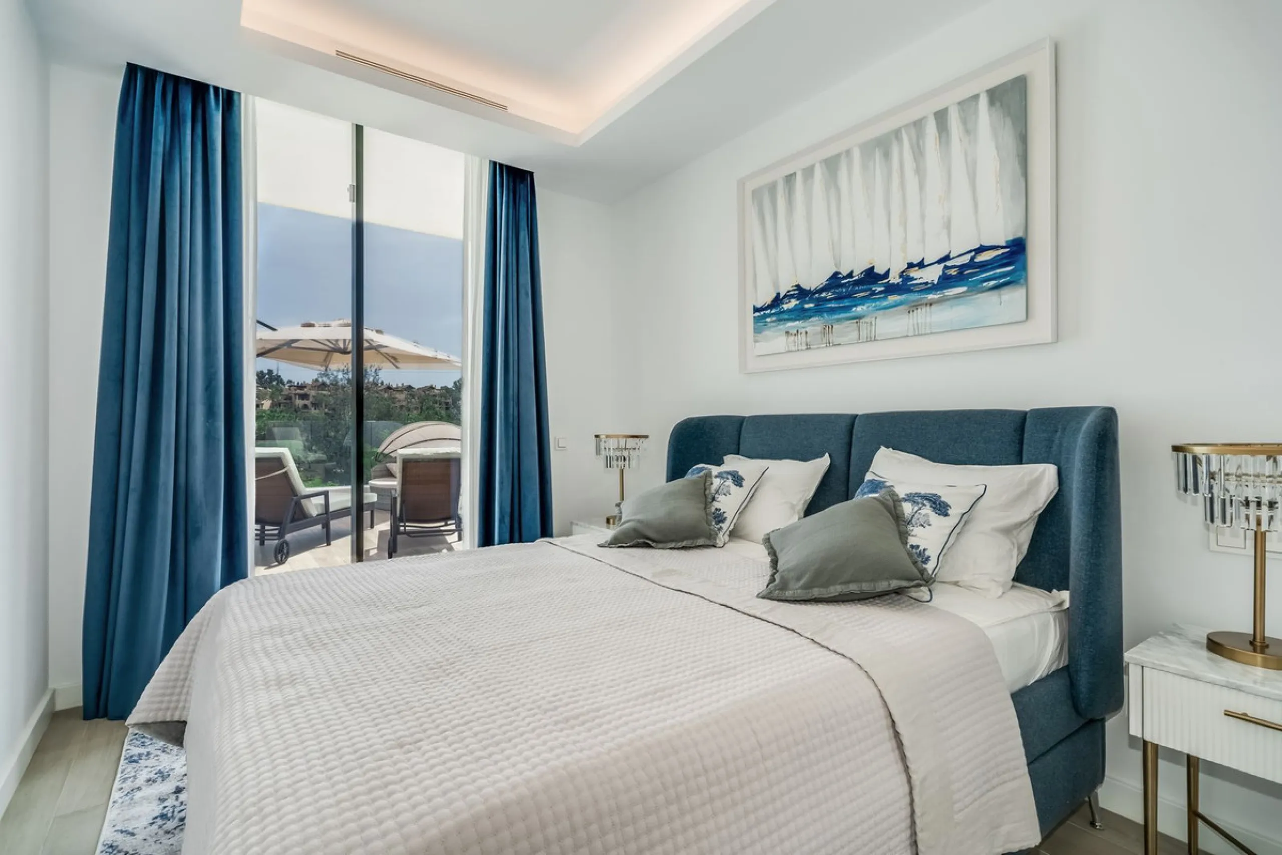 Nestled along the lush greens of Marbella's finest golf course of El Campanario, this luxurious 5-bedroom, 4.5-bath villa offers a seamless blend of elegance and state-of-the-art comfort over 460 square meters of living space. The villa's open layout invi