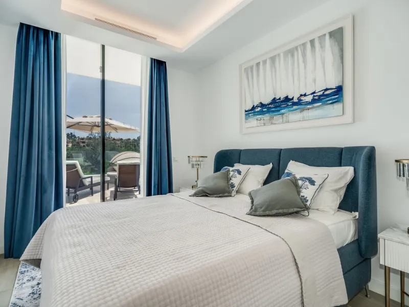 Nestled along the lush greens of Marbella's finest golf course of El Campanario, this luxurious 5-bedroom, 4.5-bath villa offers a seamless blend of elegance and state-of-the-art comfort over 460 square meters of living space. The villa's open layout invi