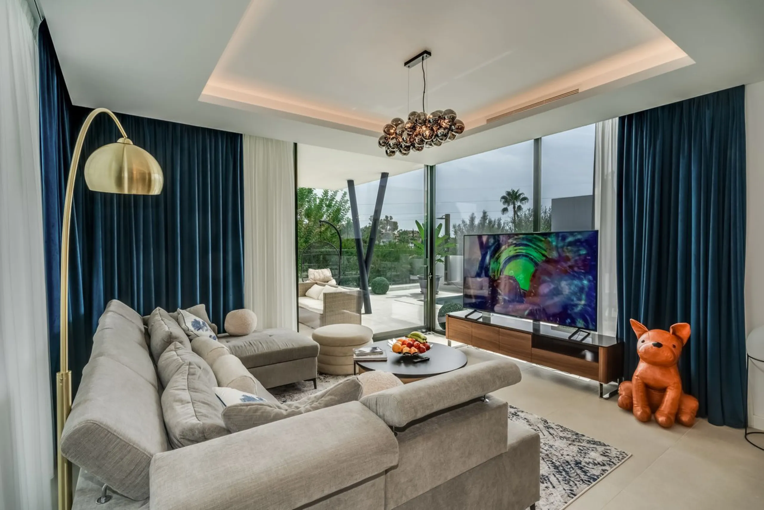 Nestled along the lush greens of Marbella's finest golf course of El Campanario, this luxurious 5-bedroom, 4.5-bath villa offers a seamless blend of elegance and state-of-the-art comfort over 460 square meters of living space. The villa's open layout invi
